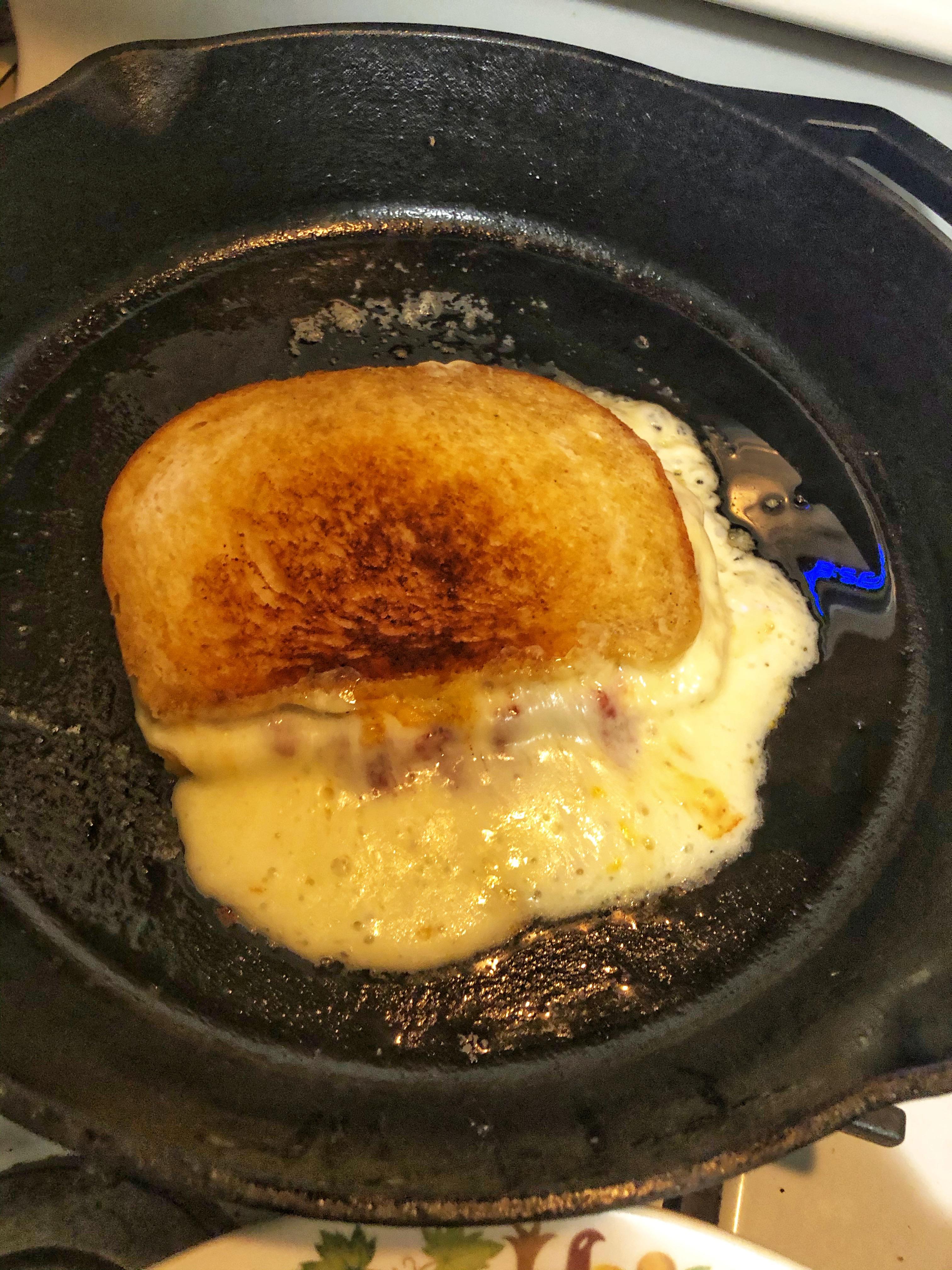 Muenster and havarti with a schmear of tomato paste and garlic salt on