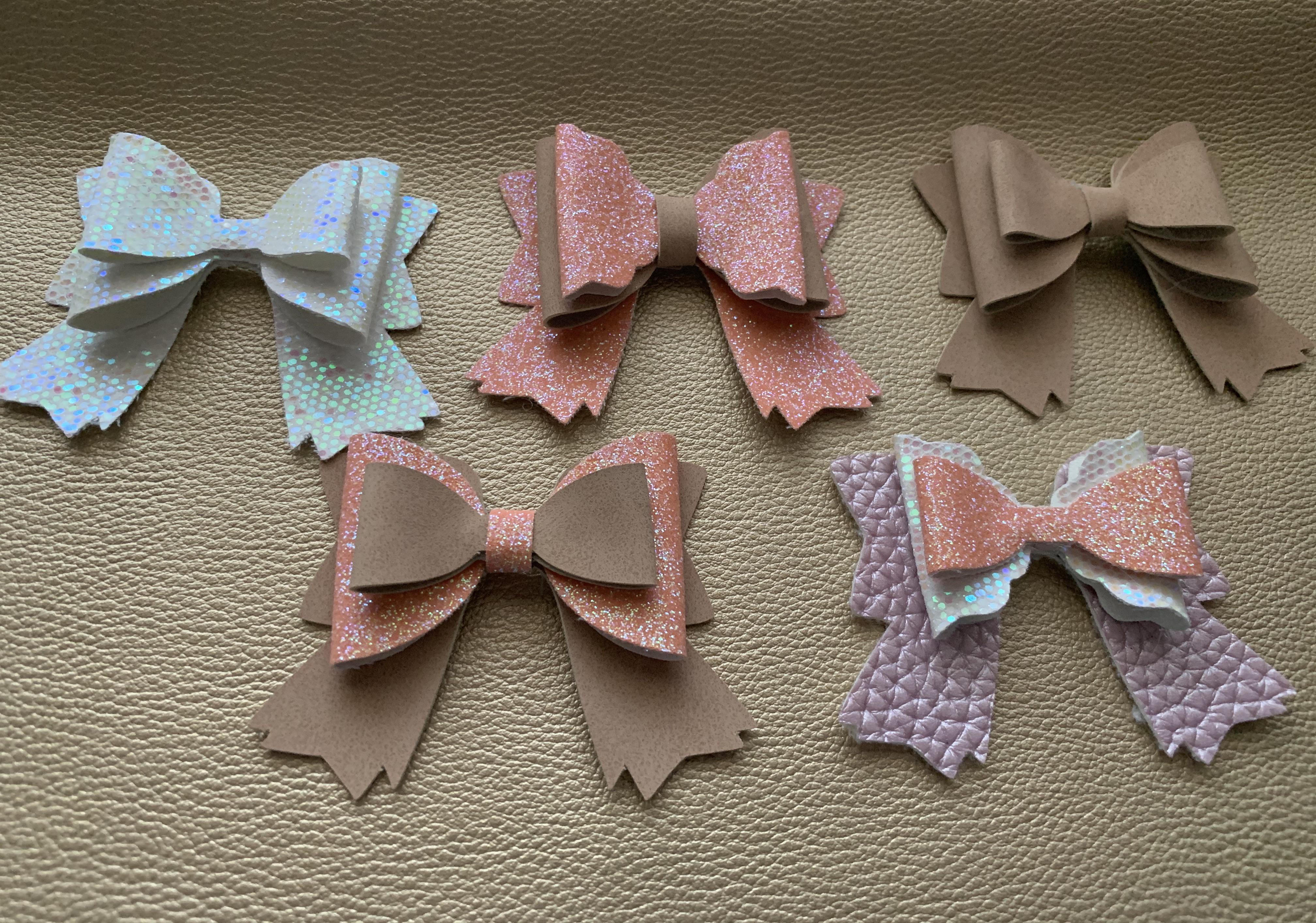 Spent the day making bows r/cricut