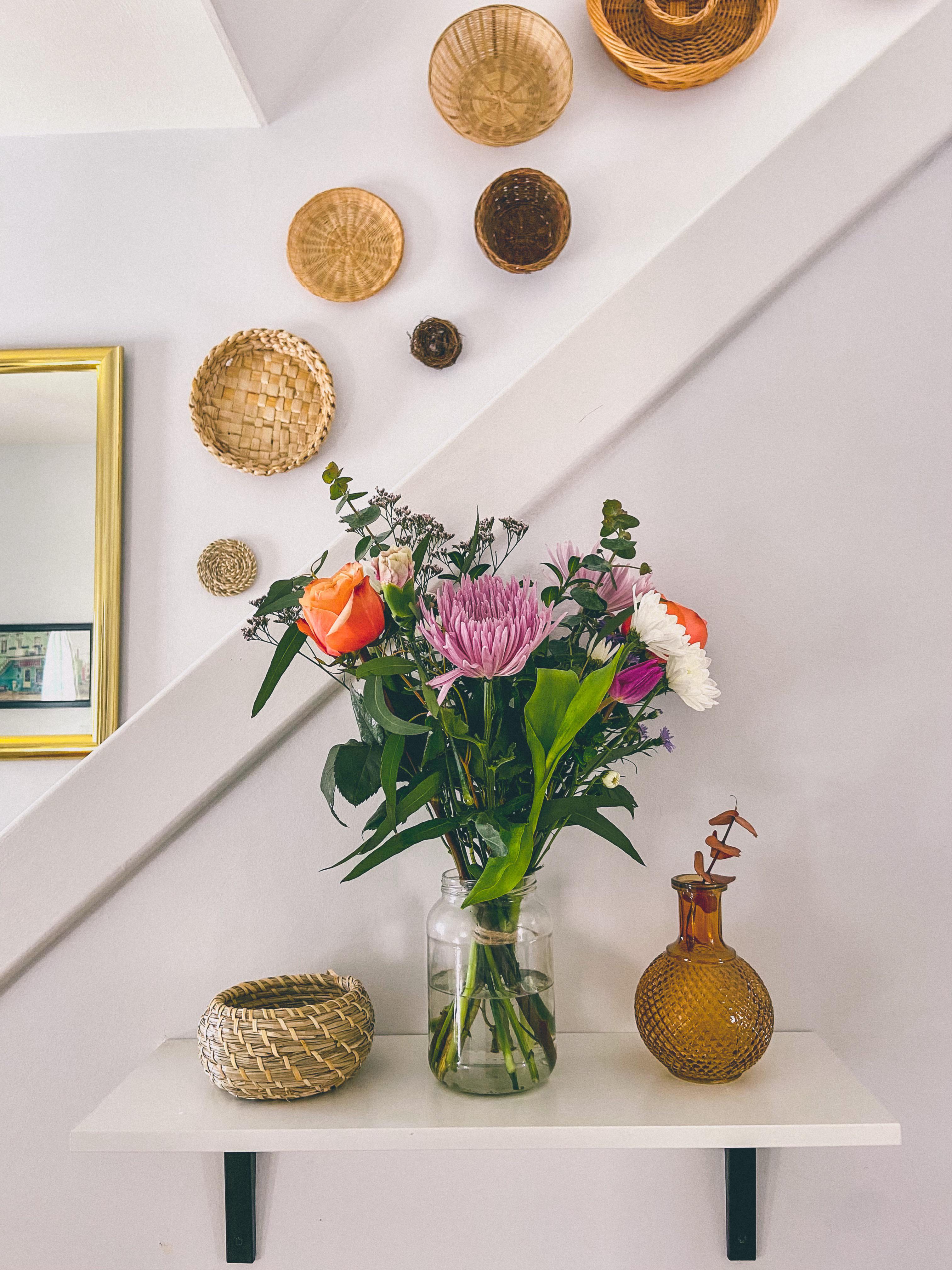 Gifted flowers, thrifted basket wall & mirror r/femalelivingspace