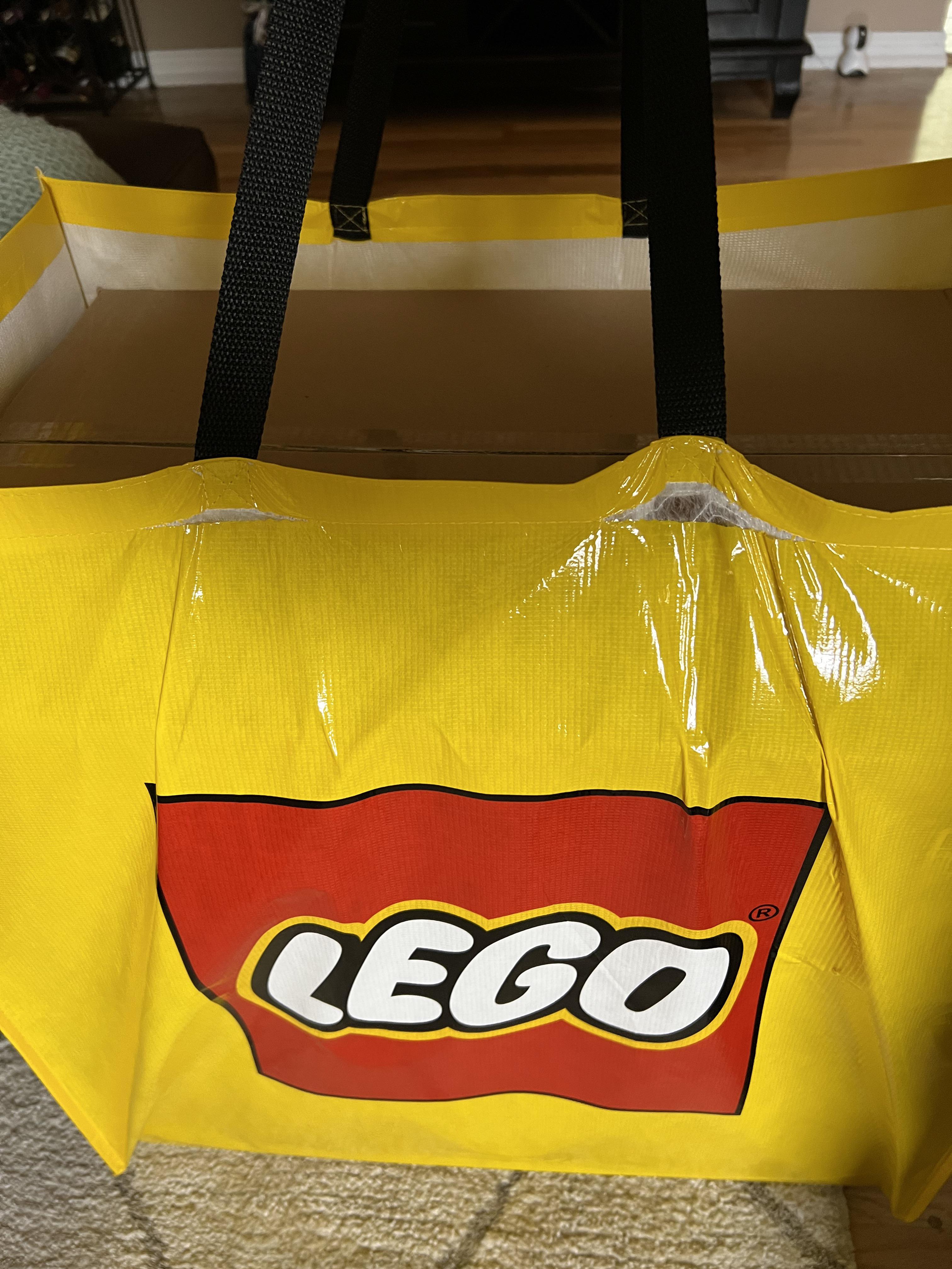 The UCS ATAT is heavy. The special Lego bag barely made it home. r/lego