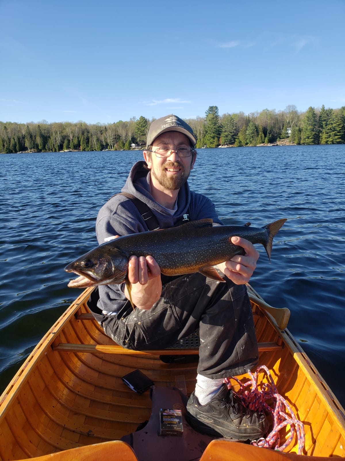 Sitting in a canoe casting mini spinners. Lake trout. Northern Ontario