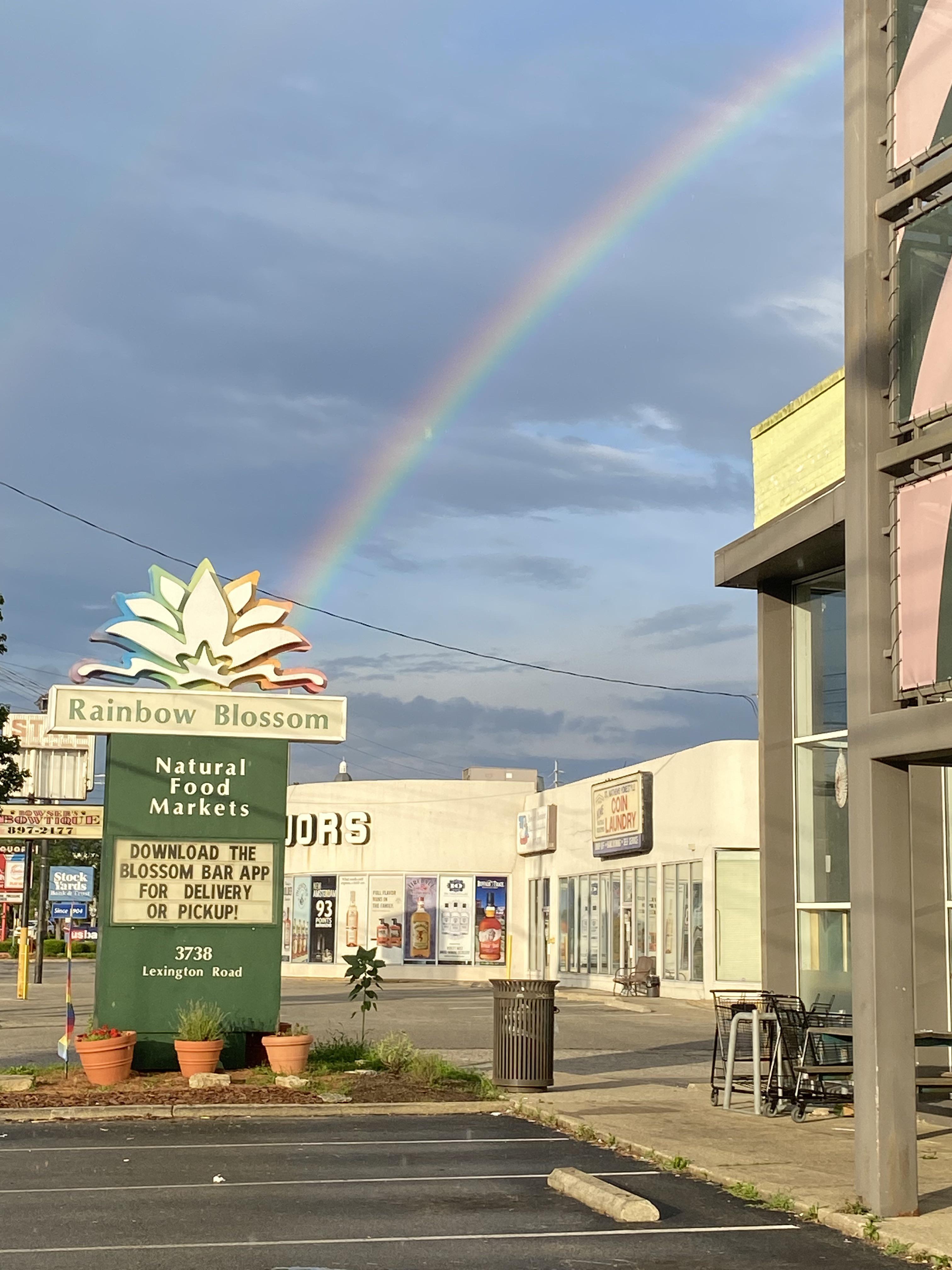 Rainbow in front of Rainbow Blossom tonight r/Louisville