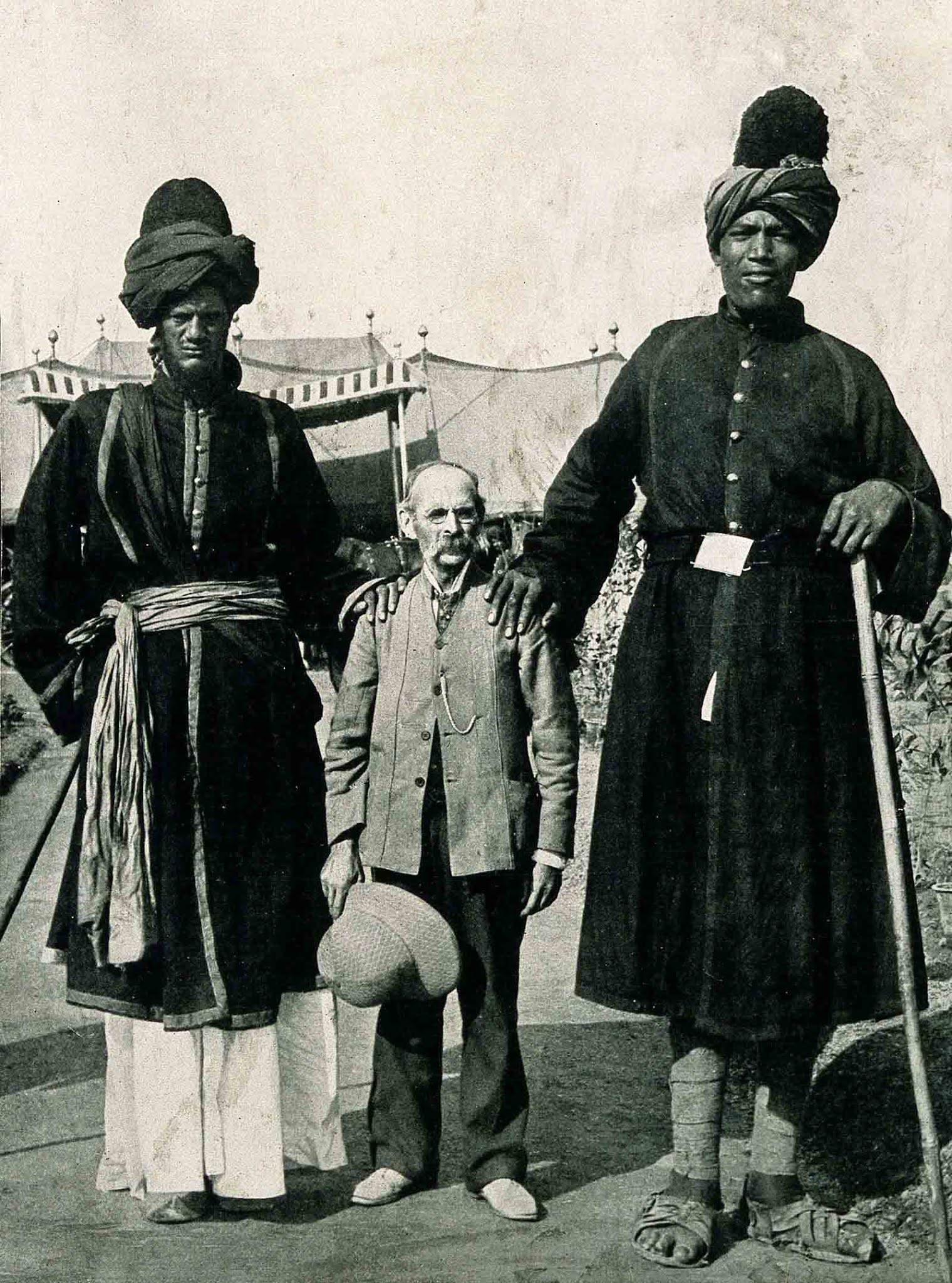 The two Kashmir Giants posing with the American photographer James