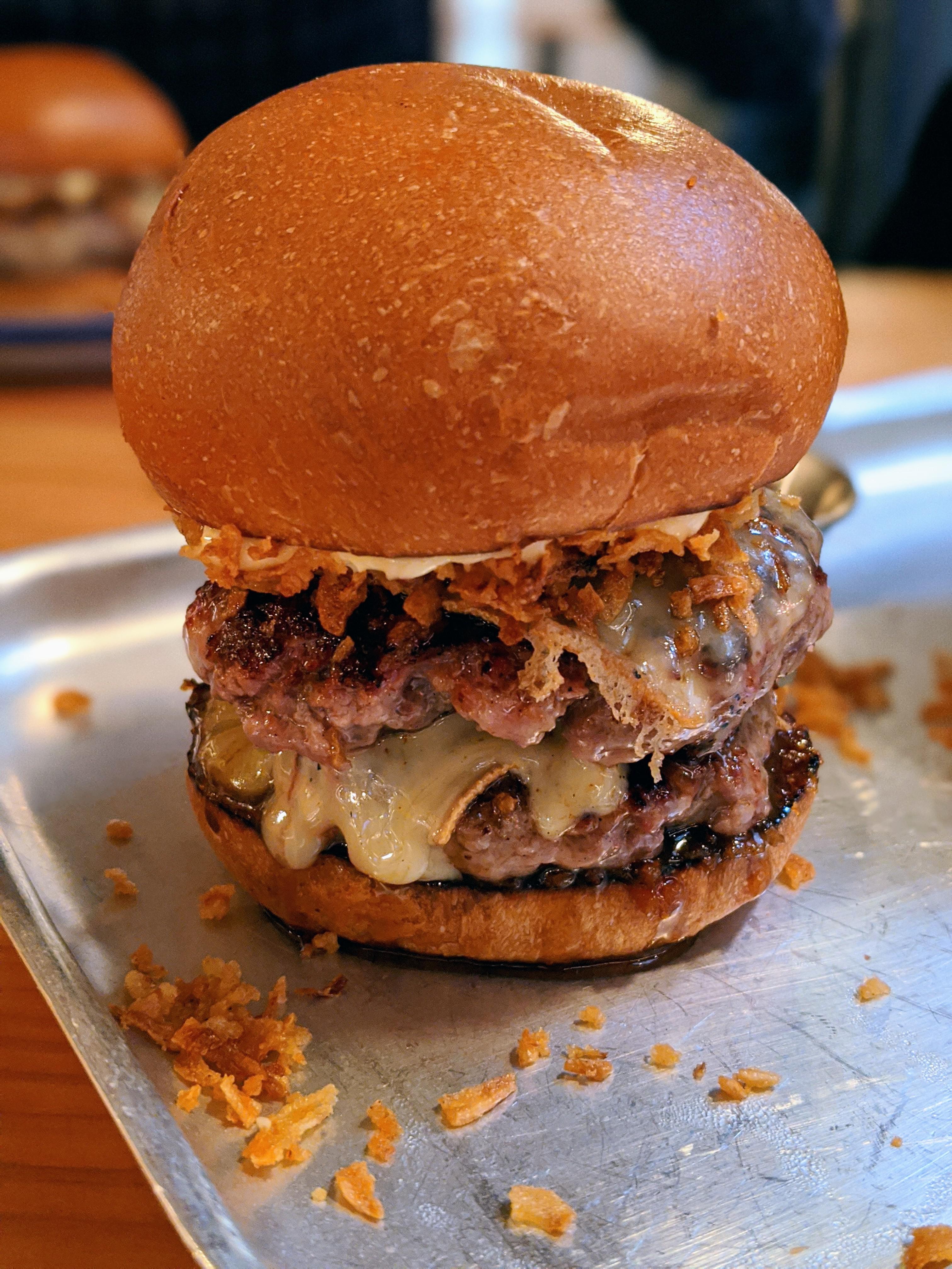 Truffle Burger, London. Double patty, bacon, crispy onions, chilli jam