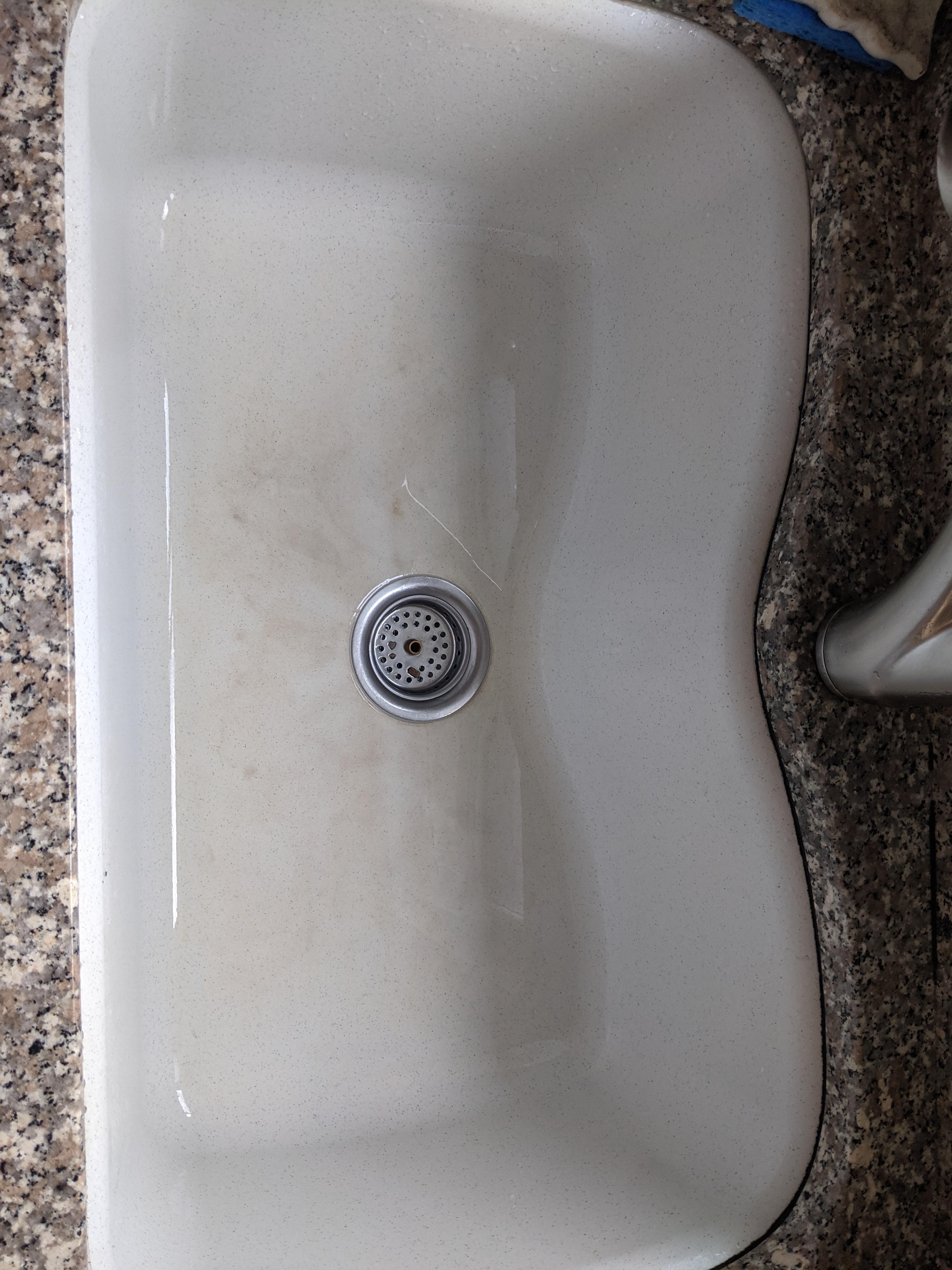 Can anyone identify what material my sink is made of and how I would be
