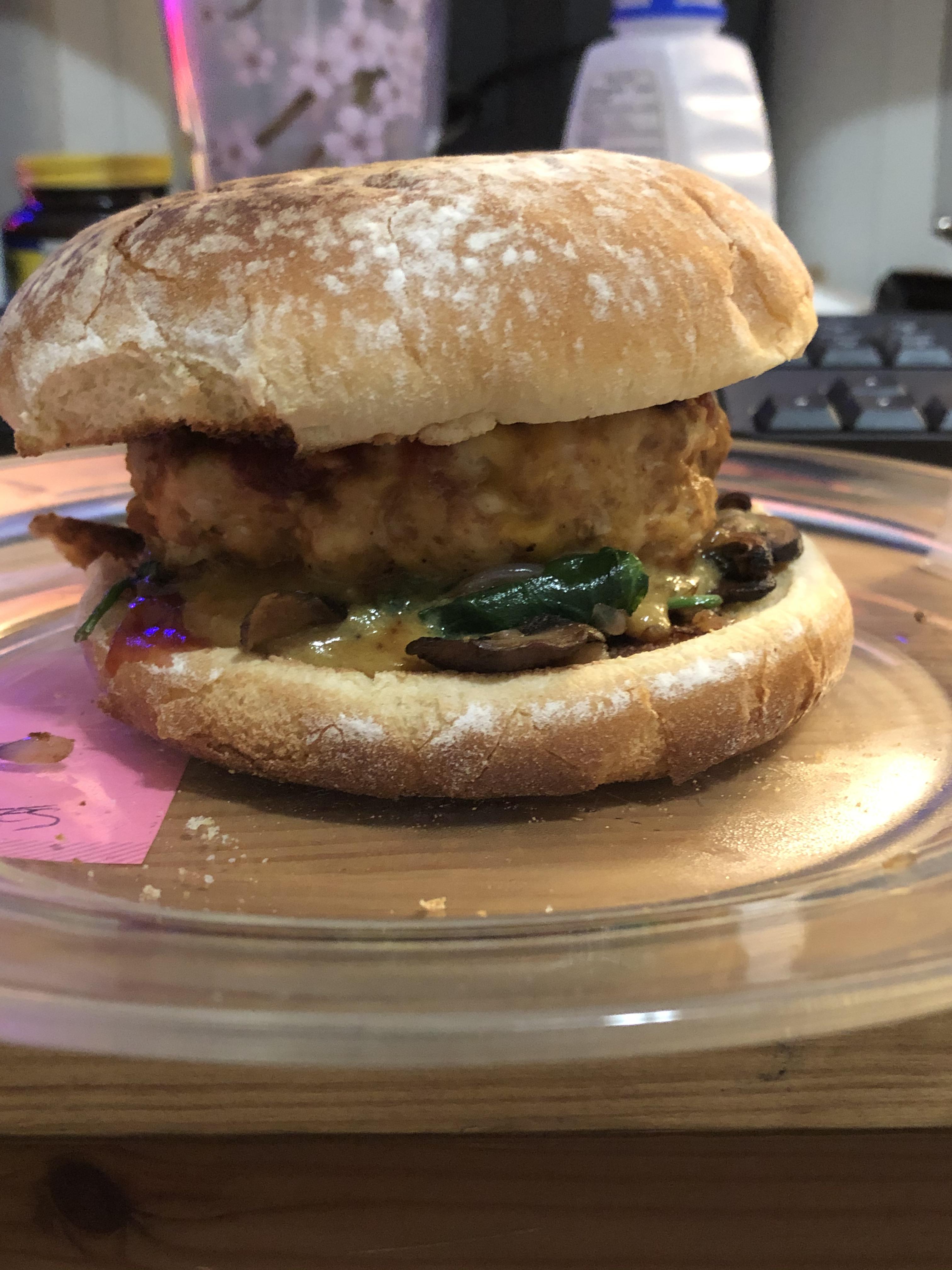 Chorizo turkey burger with sautéed mushrooms and spinach and a special