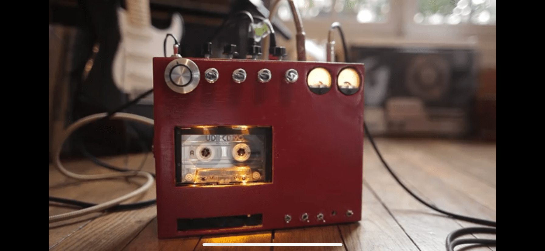 I found this guy who made a tape delay pedal with a cassette tape on