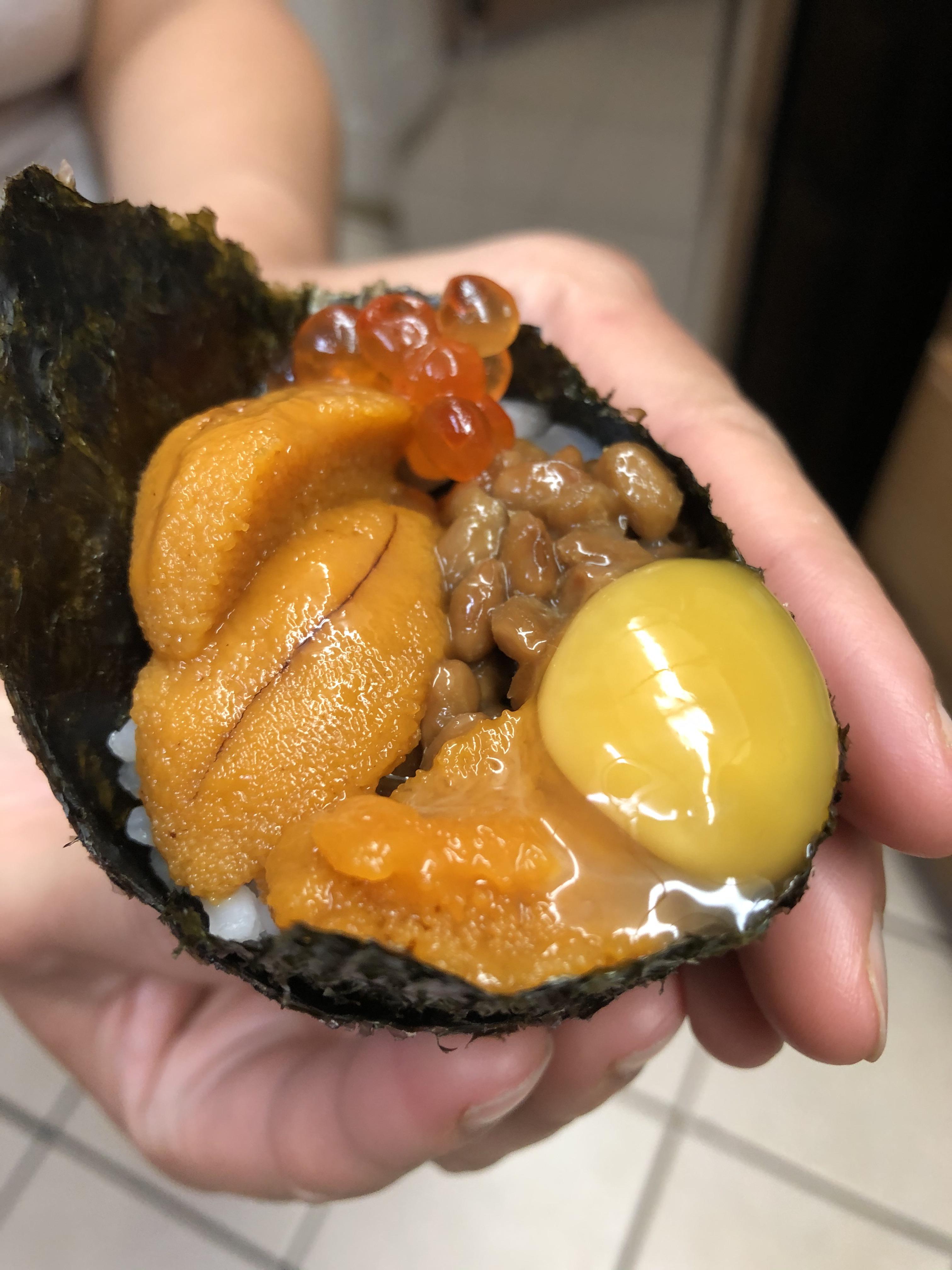 Uni, Natto, Quail egg yolk, and Salmon roe hand roll. r/sushi