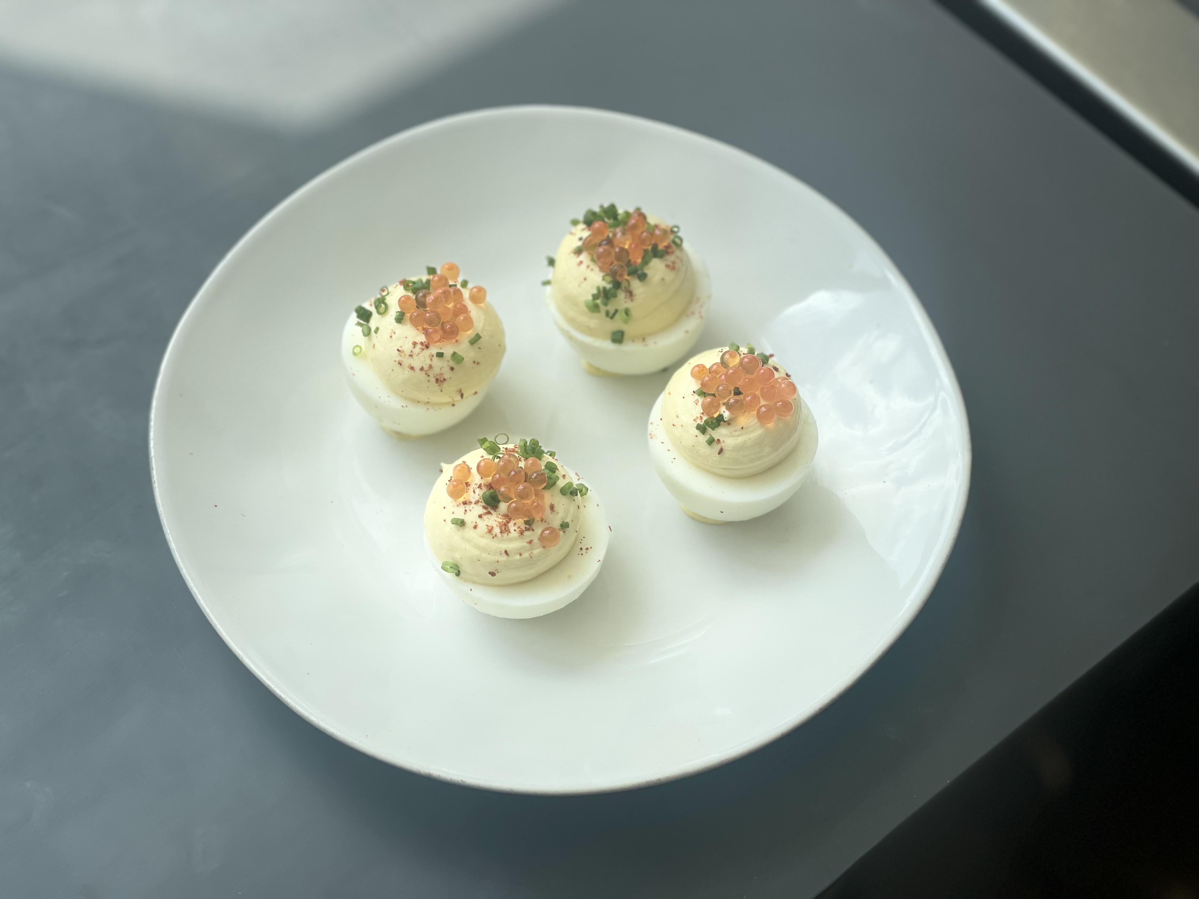 Deviled eggs with Dijon, smoked trout roe, chives, and espelette! r/eggs