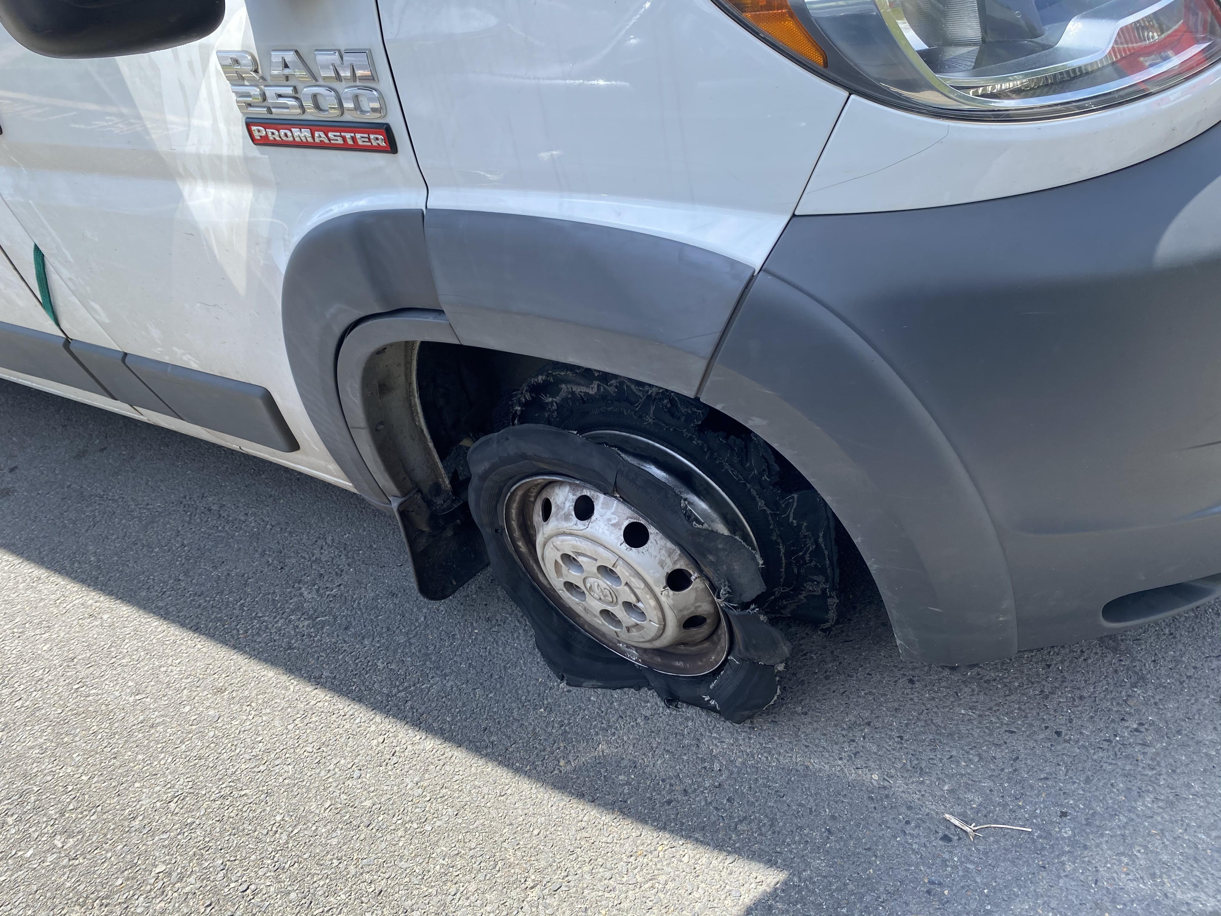 Tire nonexistent with locked caliper that was smoking. Said he Drove