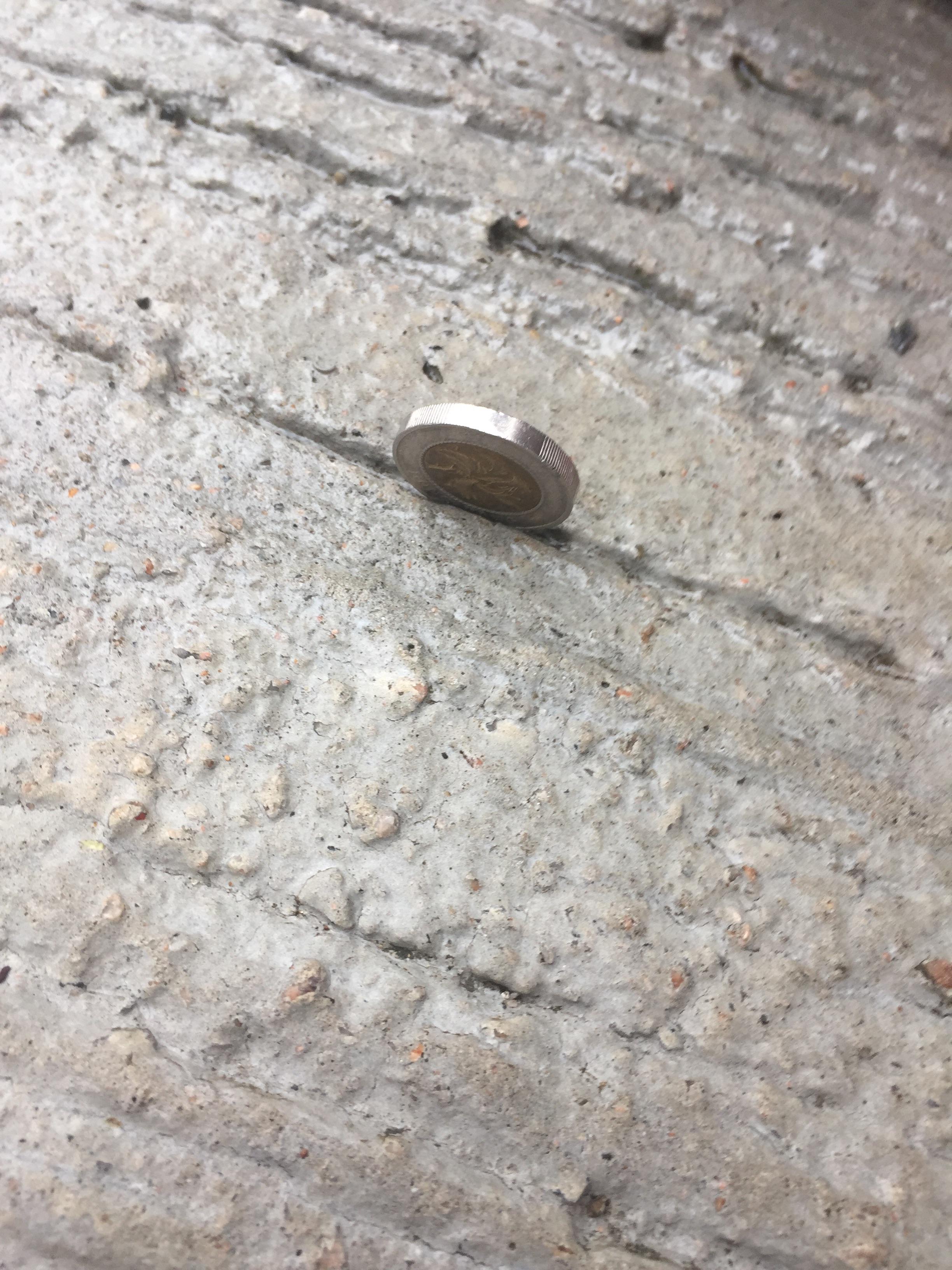 Dropped a coin onto the sidewalk, I guess it landed r/nevertellmetheodds