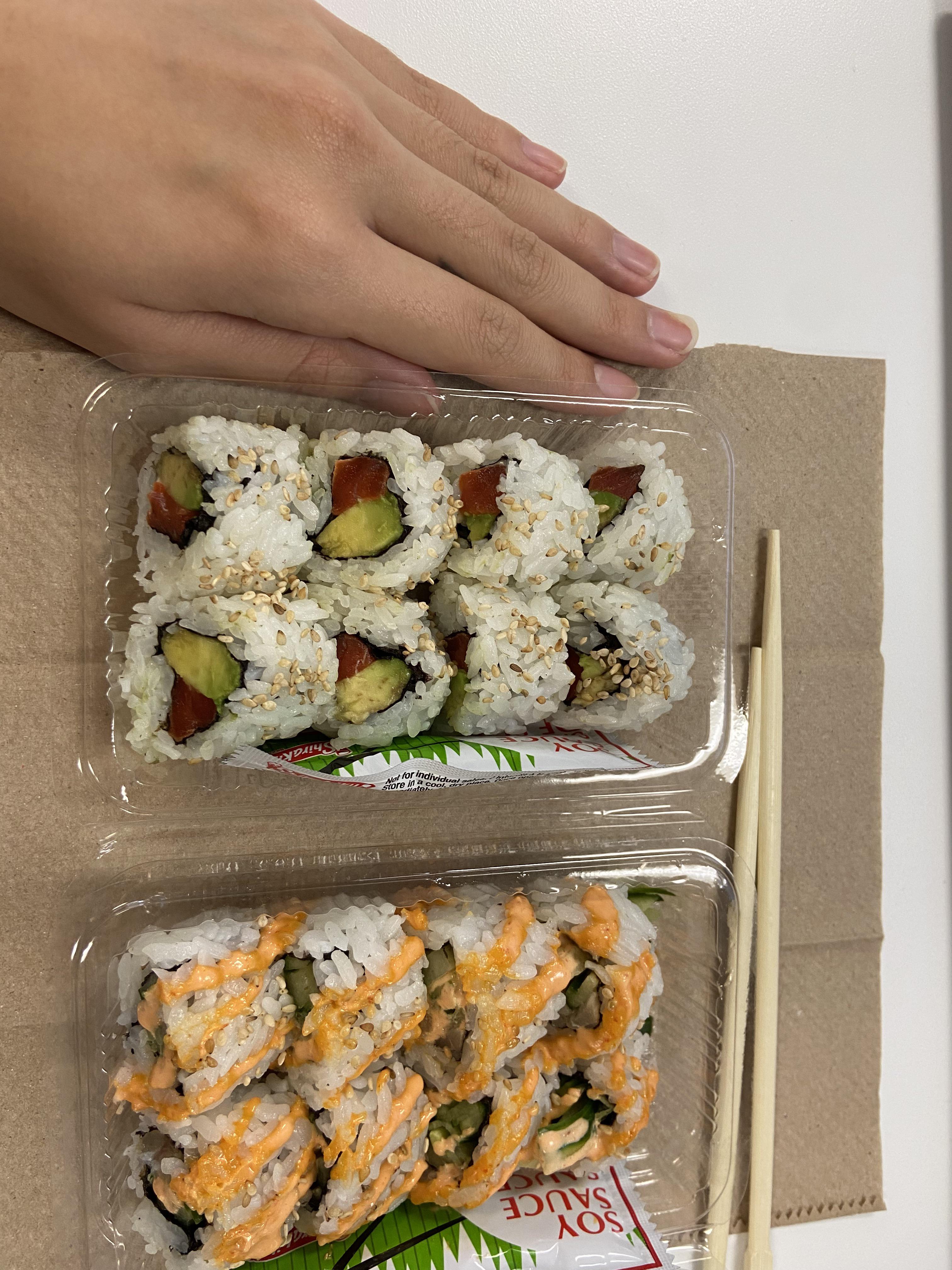 Salmon avocado roll and spicy tuna roll with cucumber calorie estimate