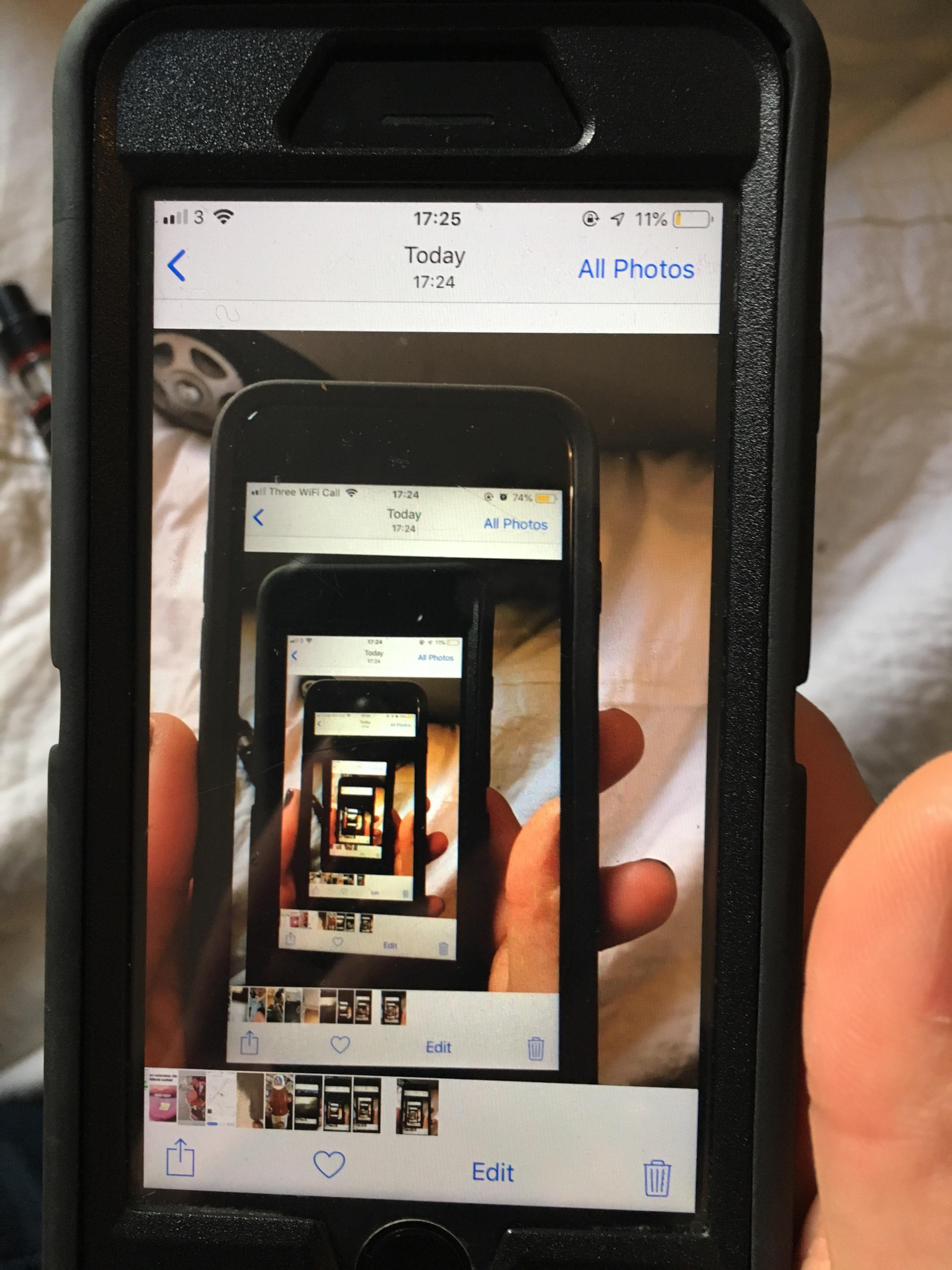 I took a photo of my boyfriends phone taking a photo of my phone taking