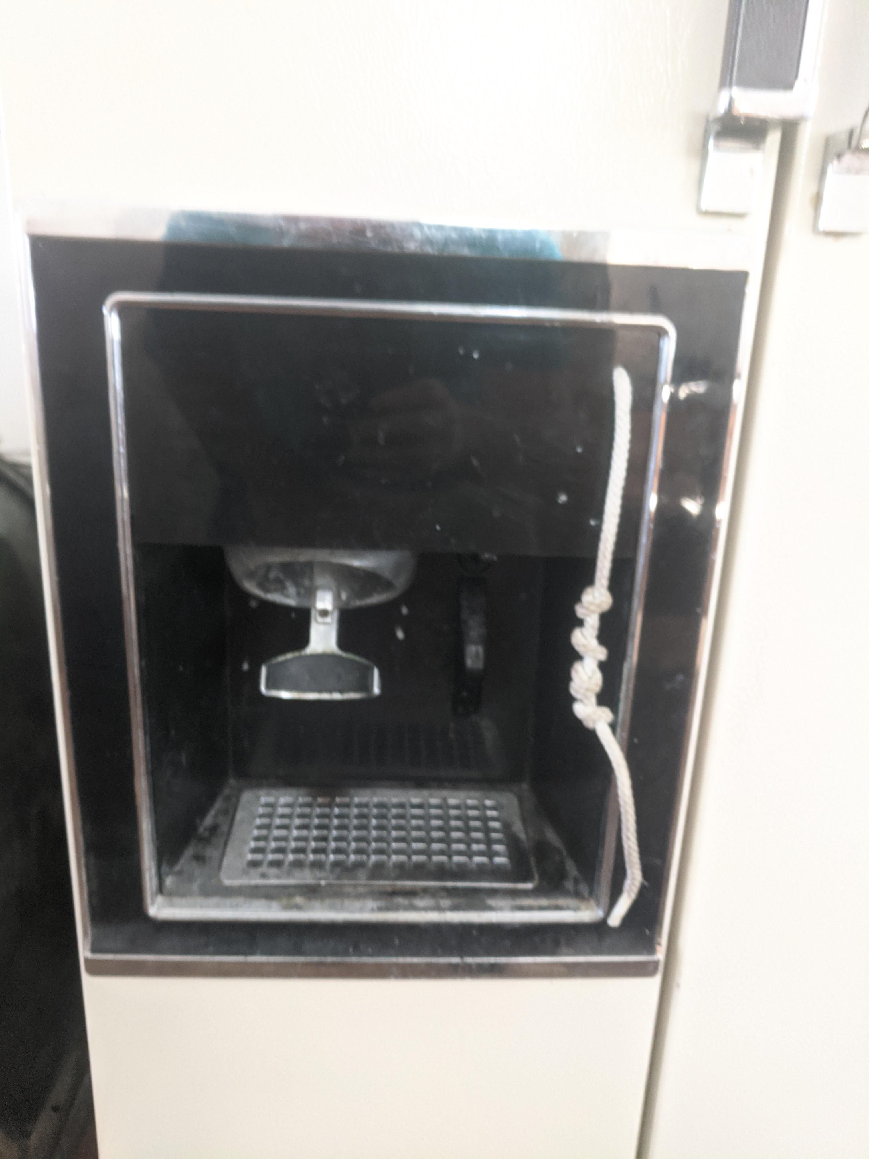 My buddy's refrigerator water dispenser button broke so he rigged it