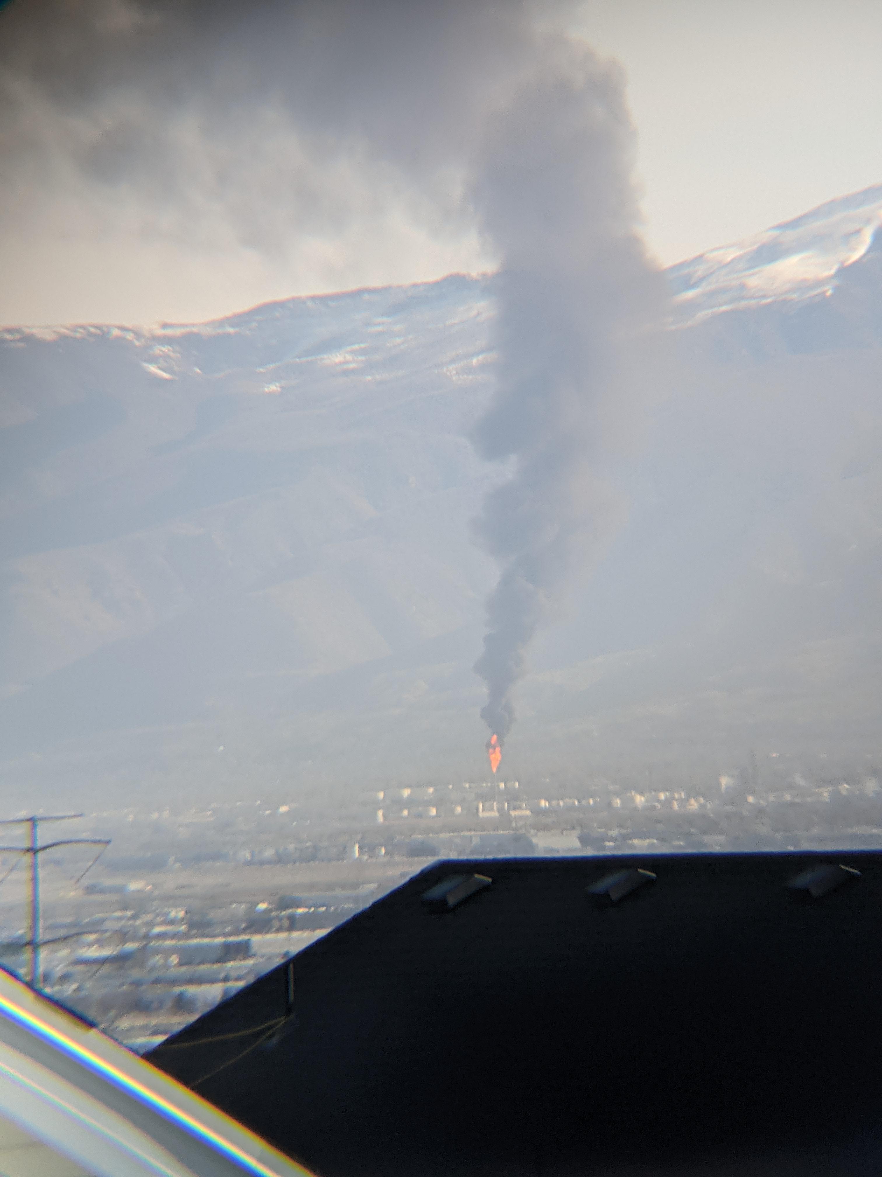 What's burning over there? Taken with my binoculars from West Valley