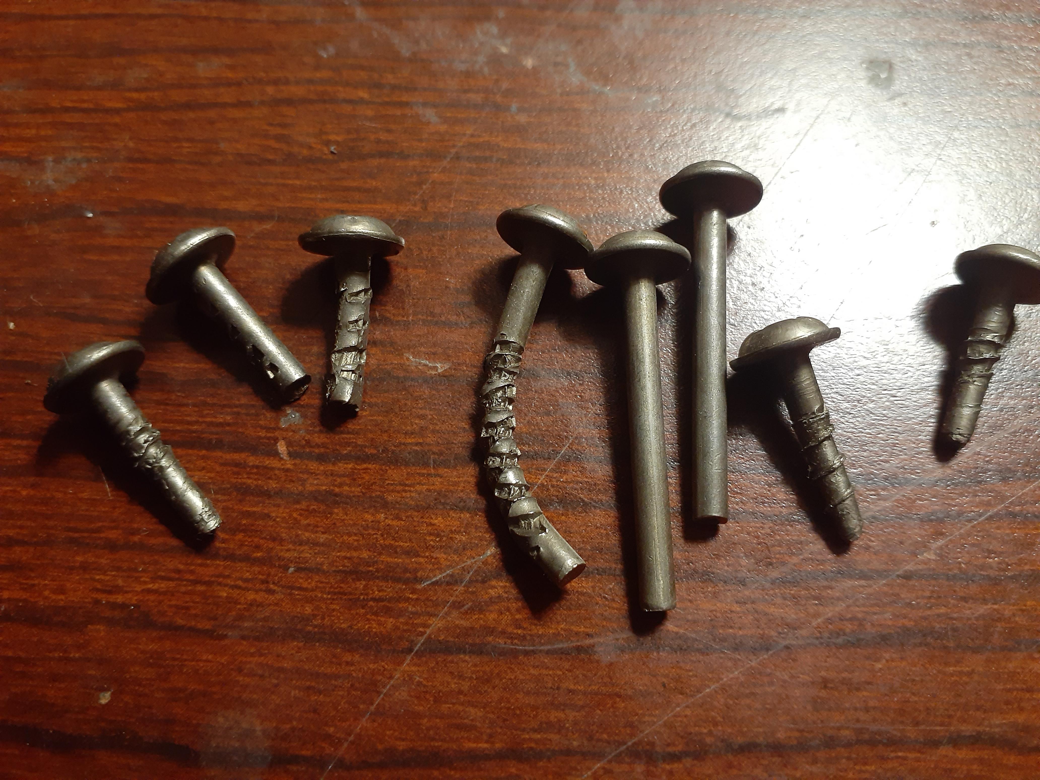 This set of defective screws from my old job at a furniture