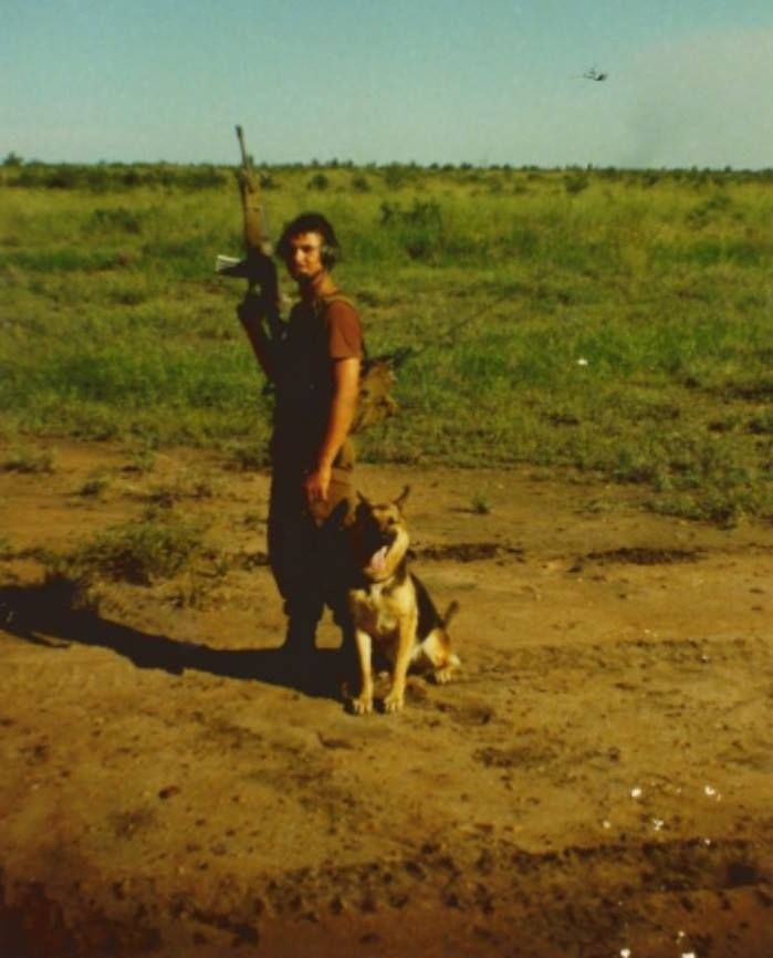 A South African K9 handler during the Angolan Bush War. (19661989) r/southafrica