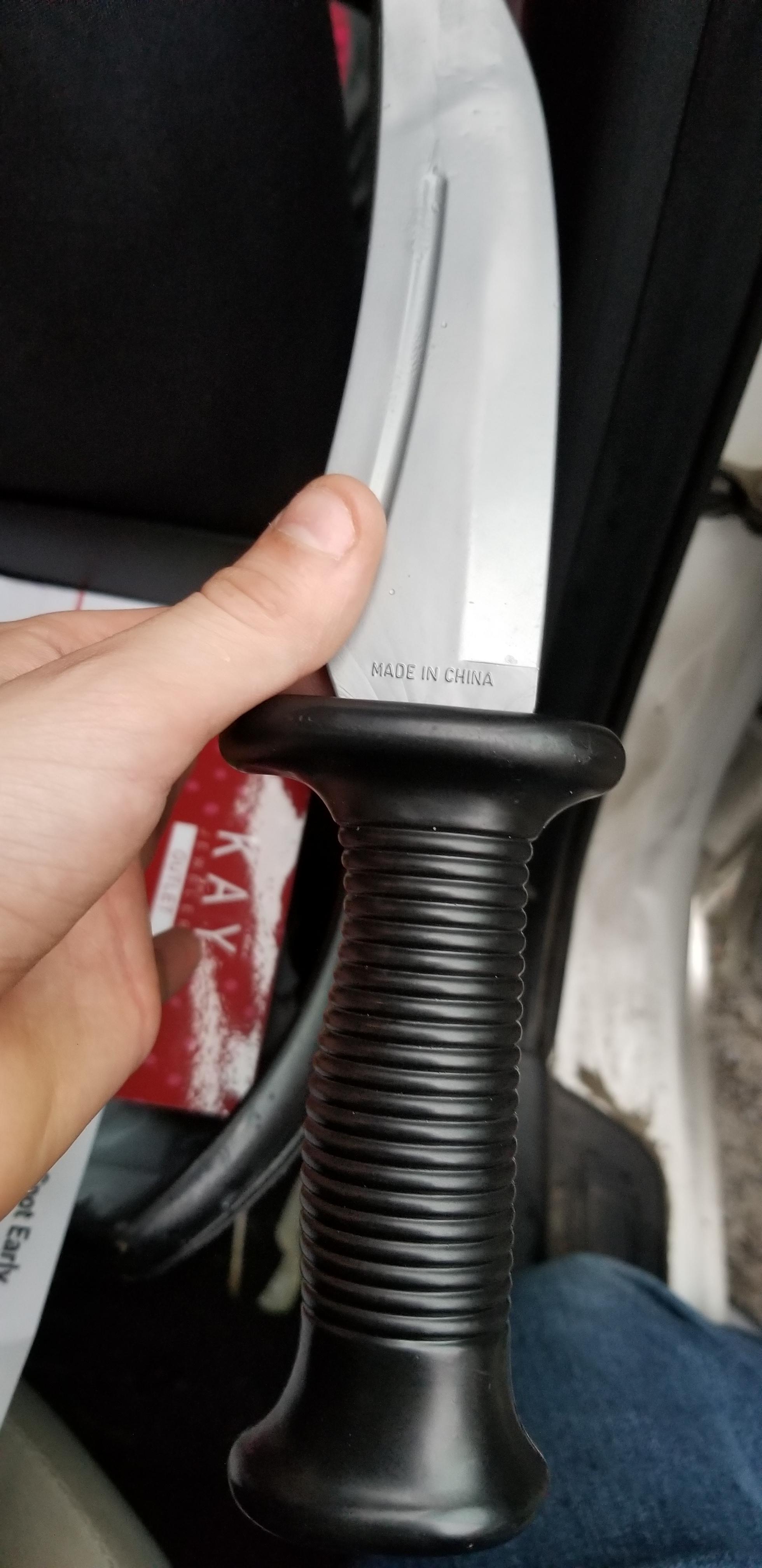 The handle Is facing away from the knife blade so that you have to hold