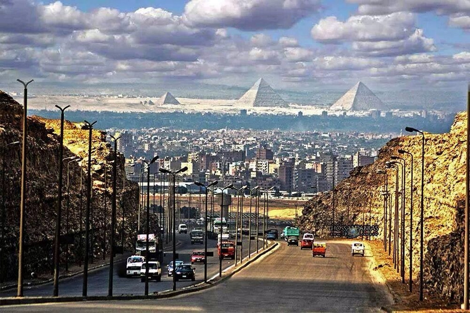 The Great Egyptian Pyramids, as Viewed from the Streets of Cairo. r