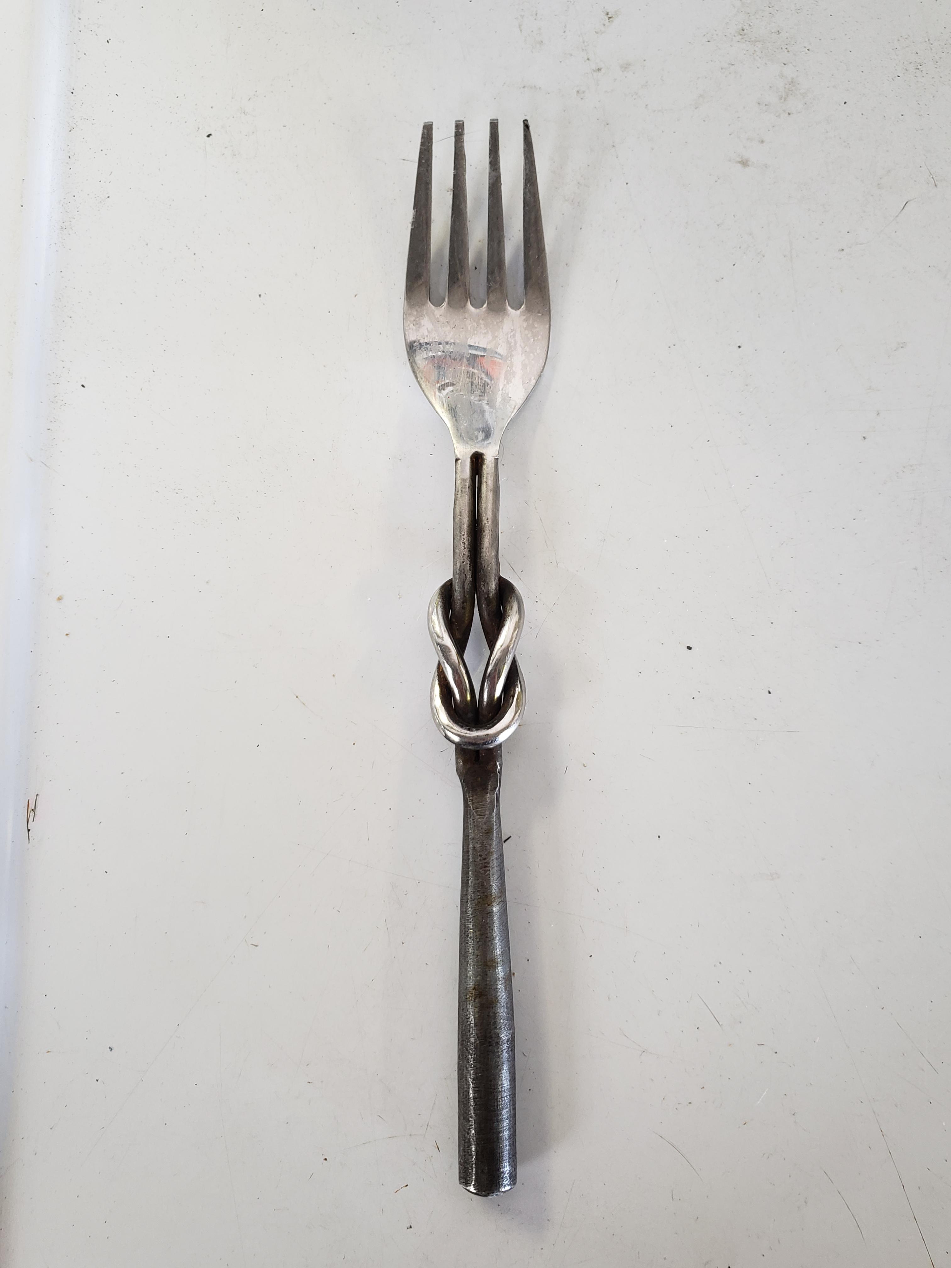This twisted fork my boyfriend found on the ground at our work. r