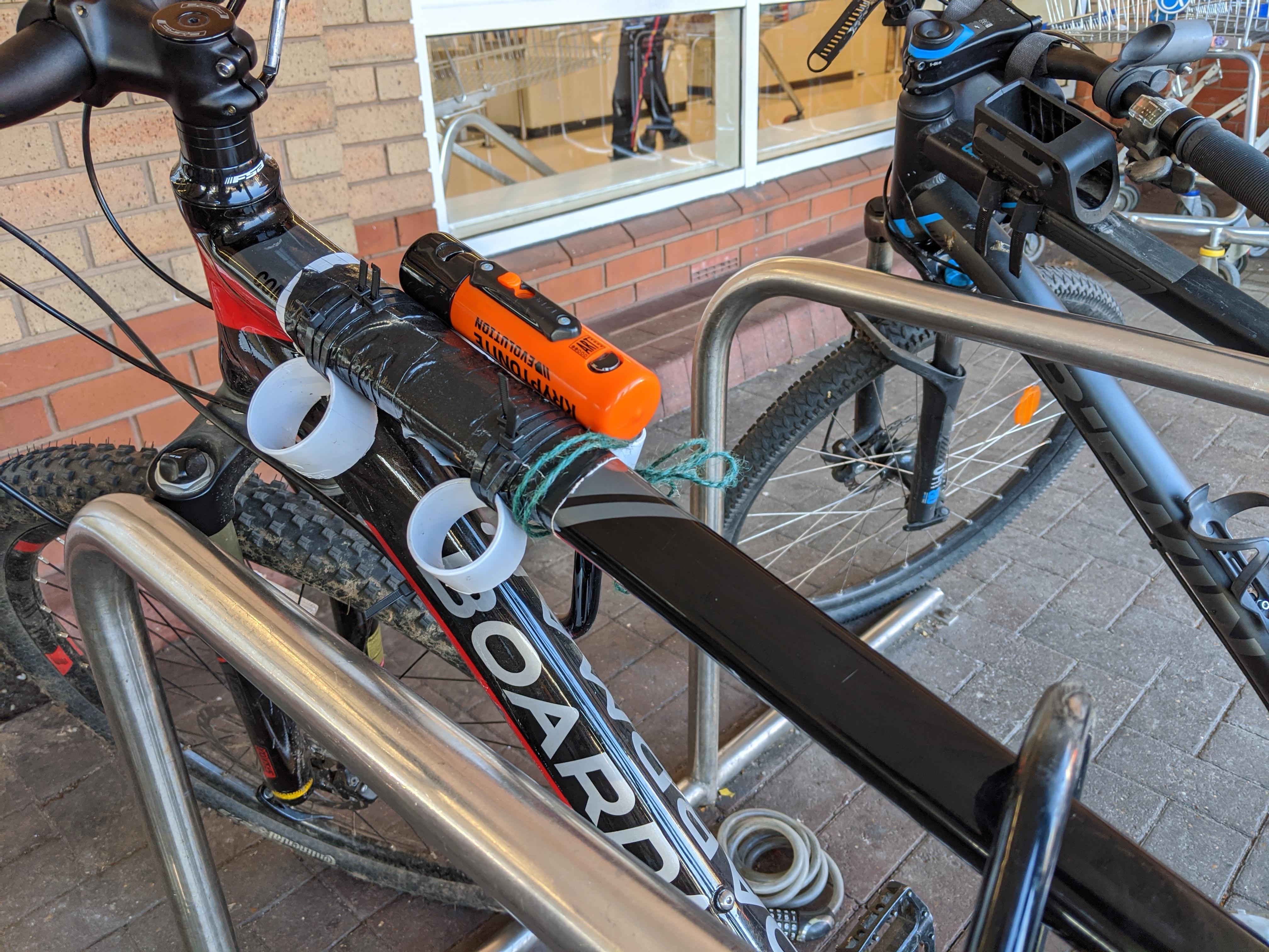 Creative double Dlock holder I found r/Justridingalong