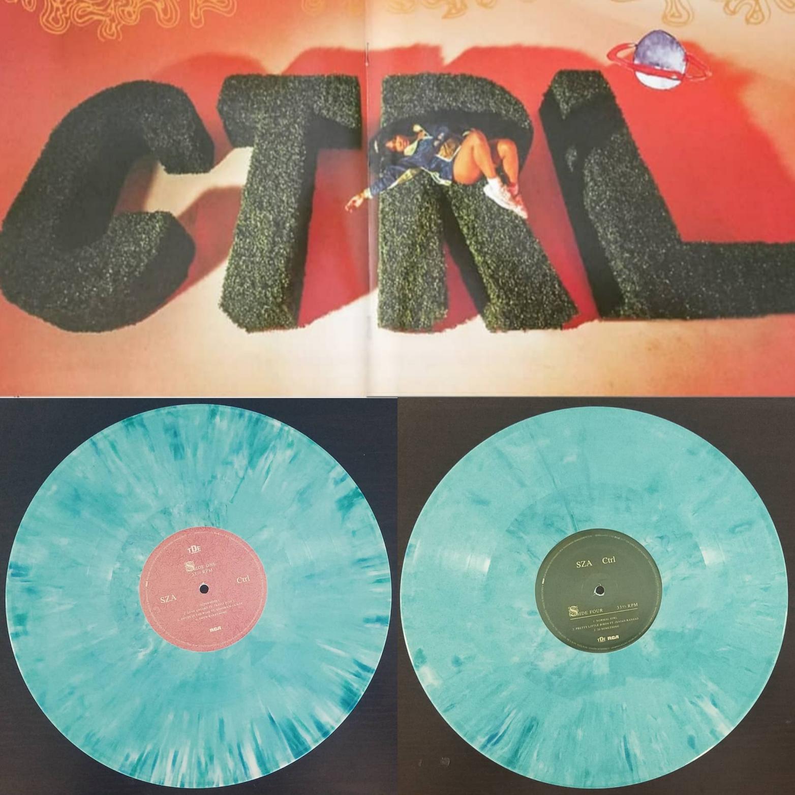 SZA's "Control" on Urban Outfitter's exclusive marbled Teal. r