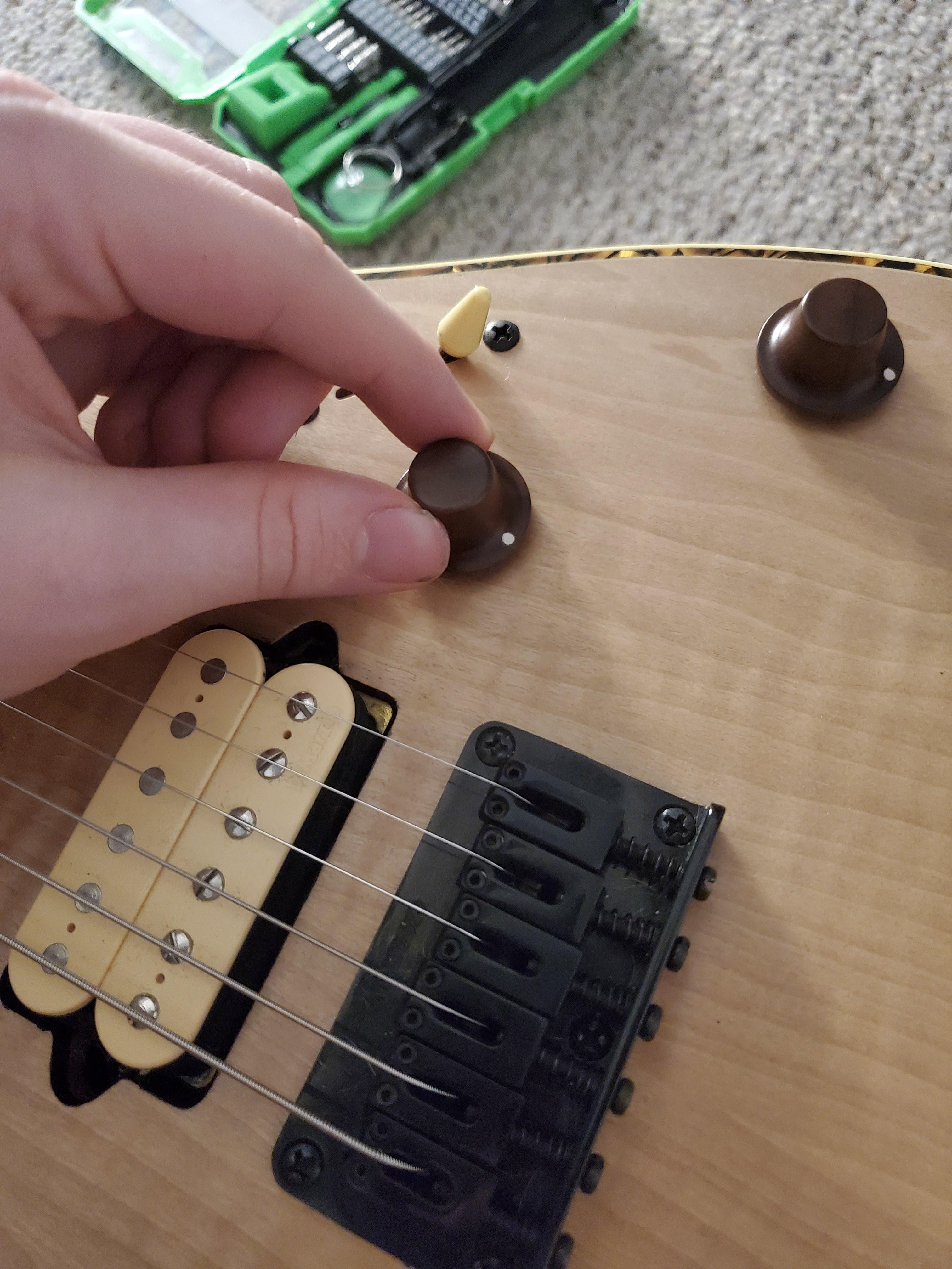 Does anyone know how to get these wooden knobs off? Pot came loose. r