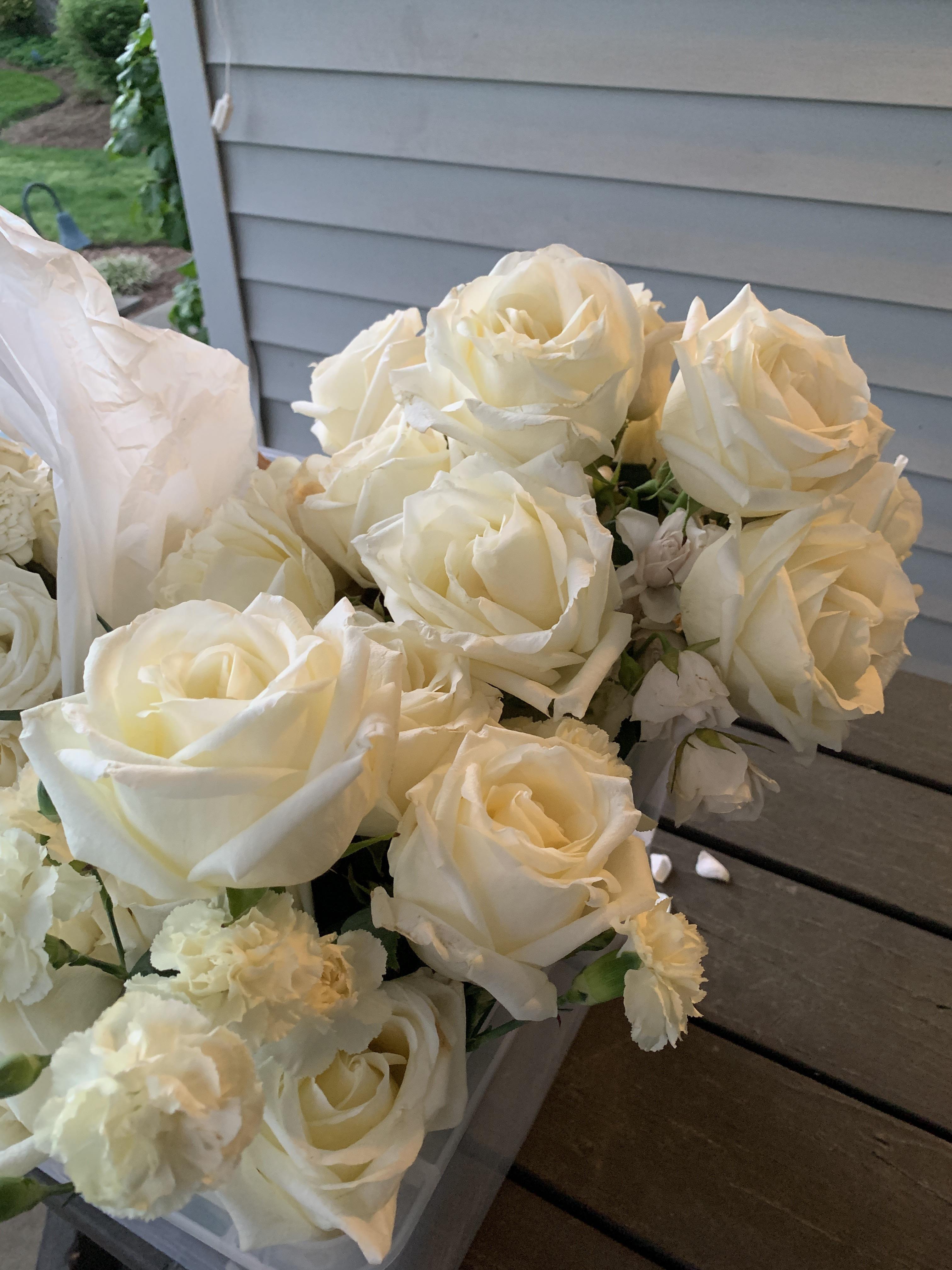 Trying to figure out something that I can do with these leftover roses from our wedding