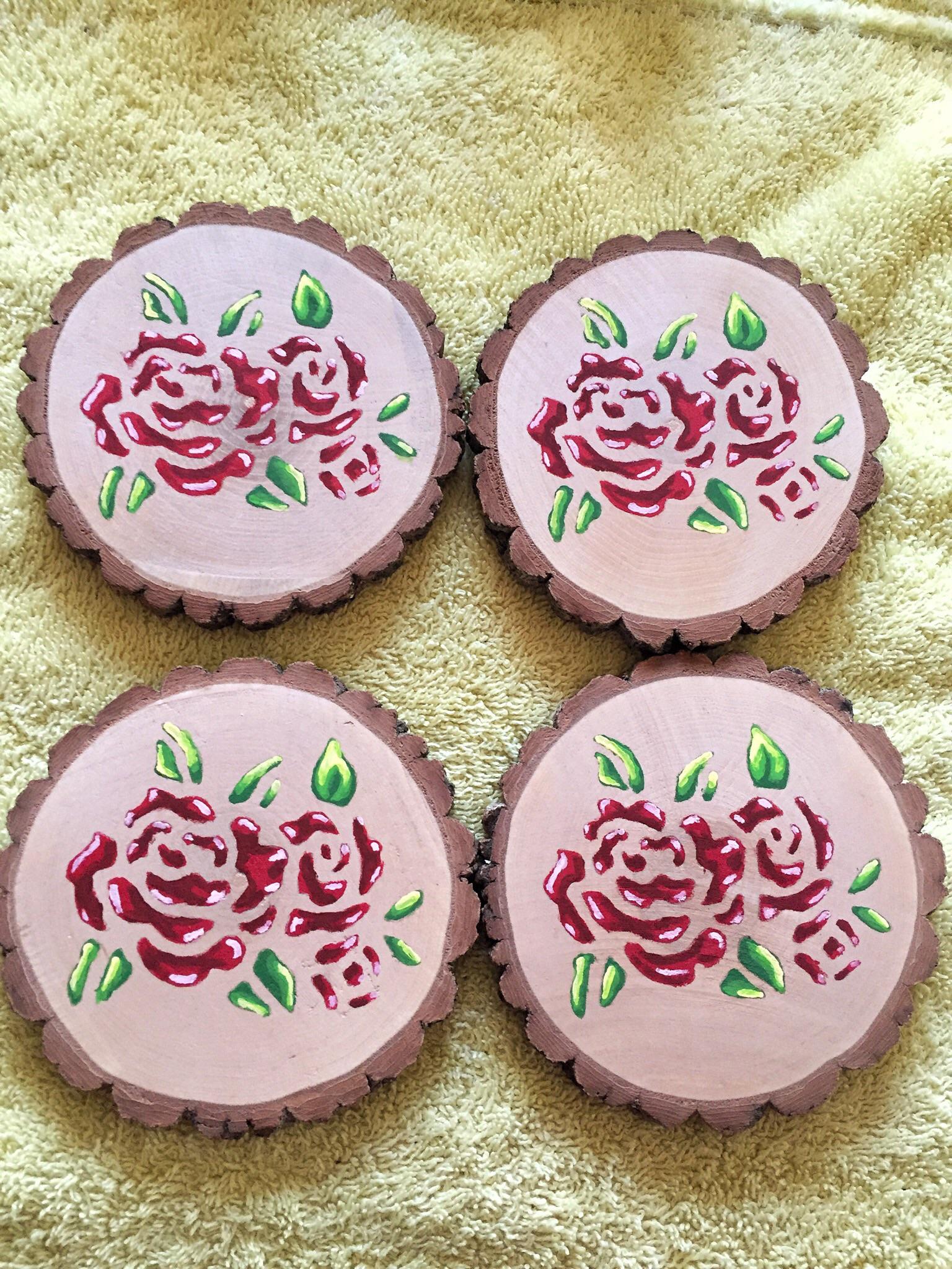 Homemade & Hand painted wood slice coasters I made for a Christmas