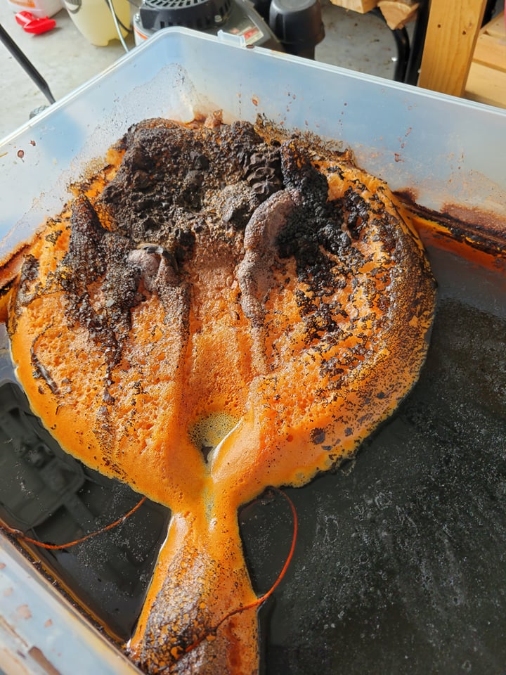 After the lye bath I placed my cast iron in a vinegar bath to knock off