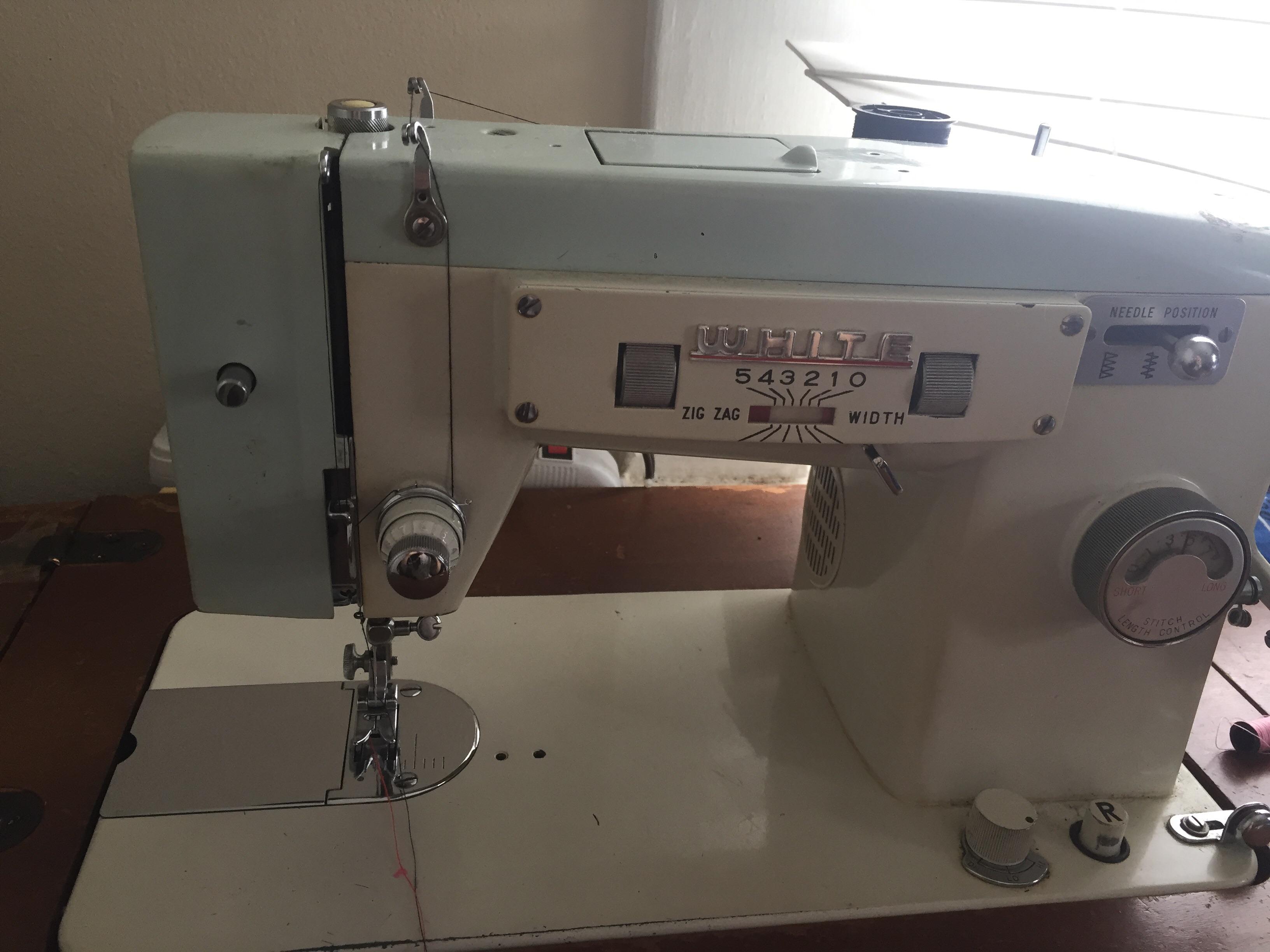 1960’s white sewing machine. Tension knob issues when thread is