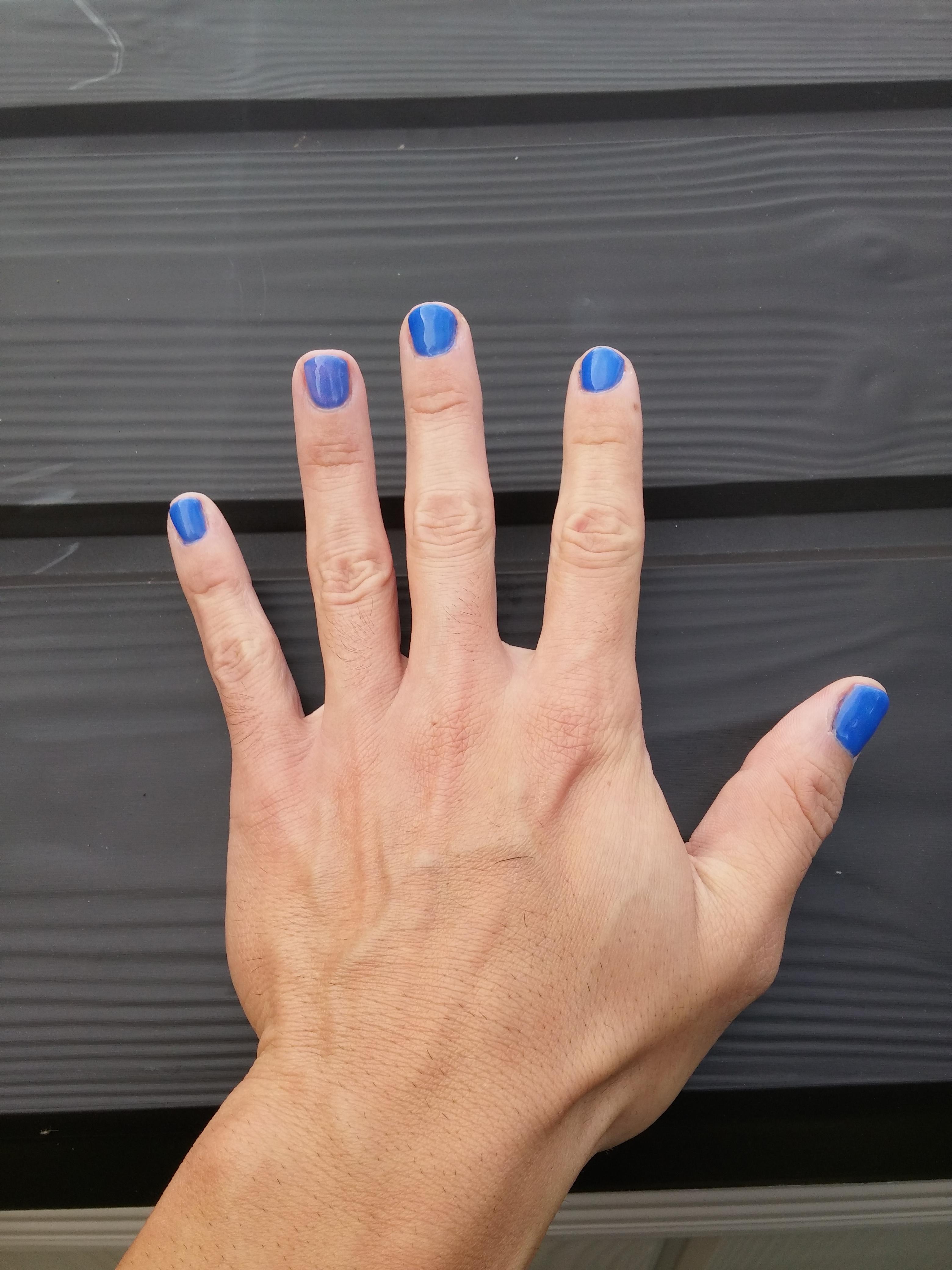 Royal blue gel polish with frost effect on ring finger r/malepolish