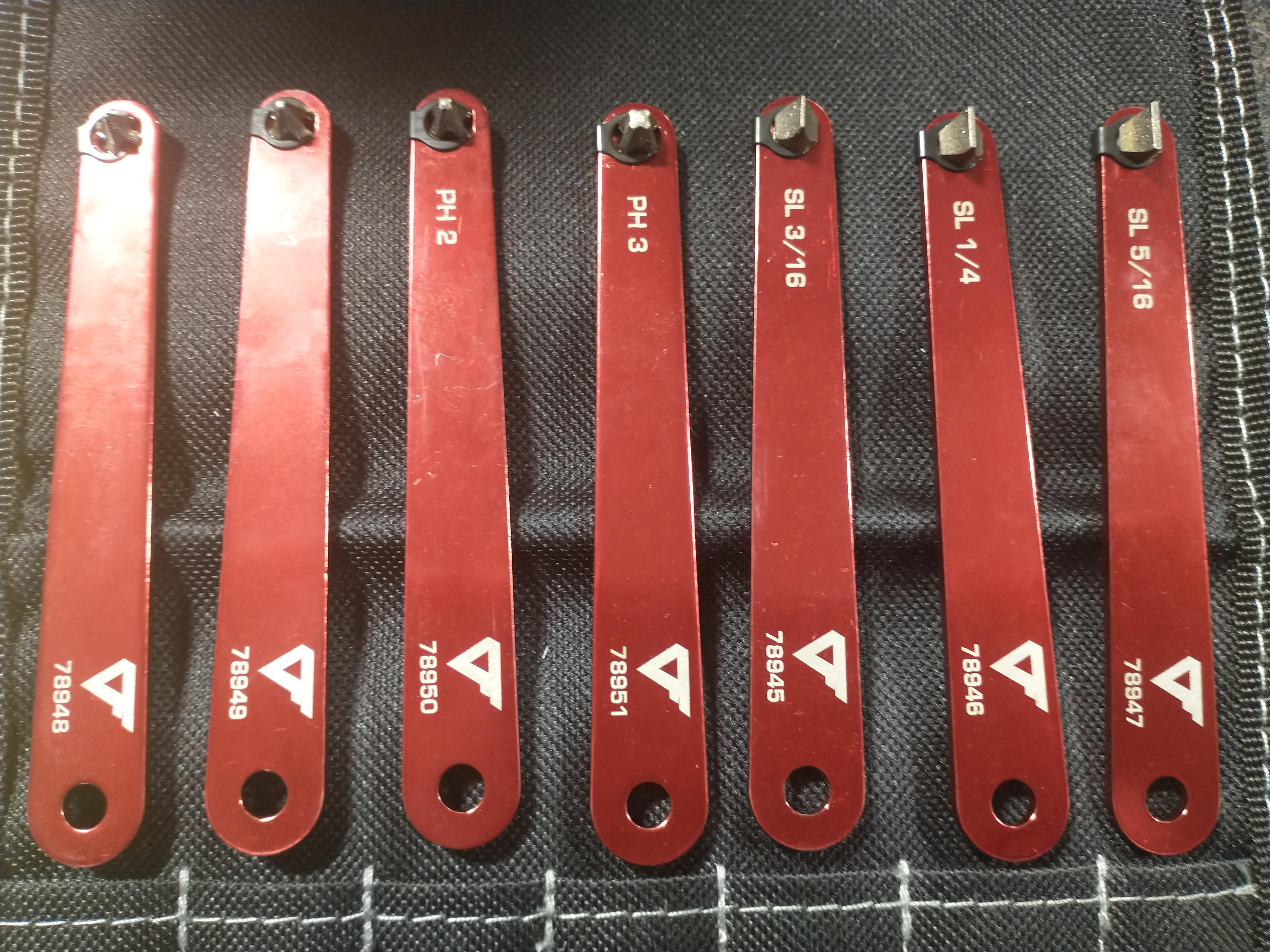 Ultra low profile screwdrivers for fasteners in tight spots. r