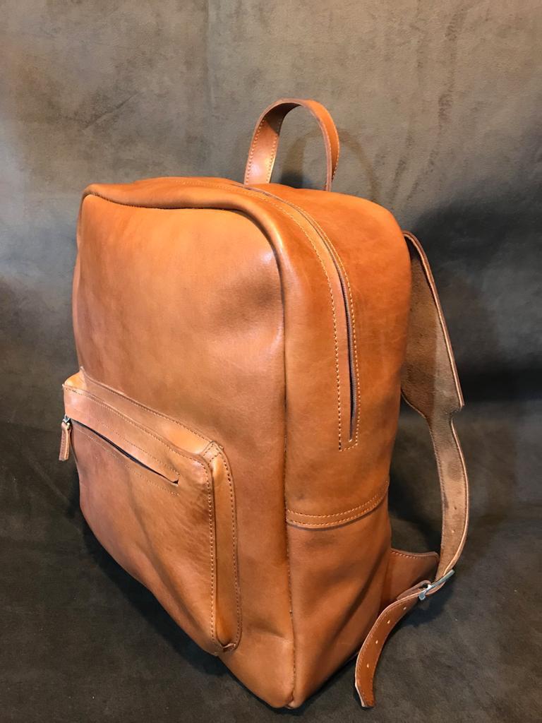 A handmade real leather backpack I bought from Middle East for 30 r/Leathercraft