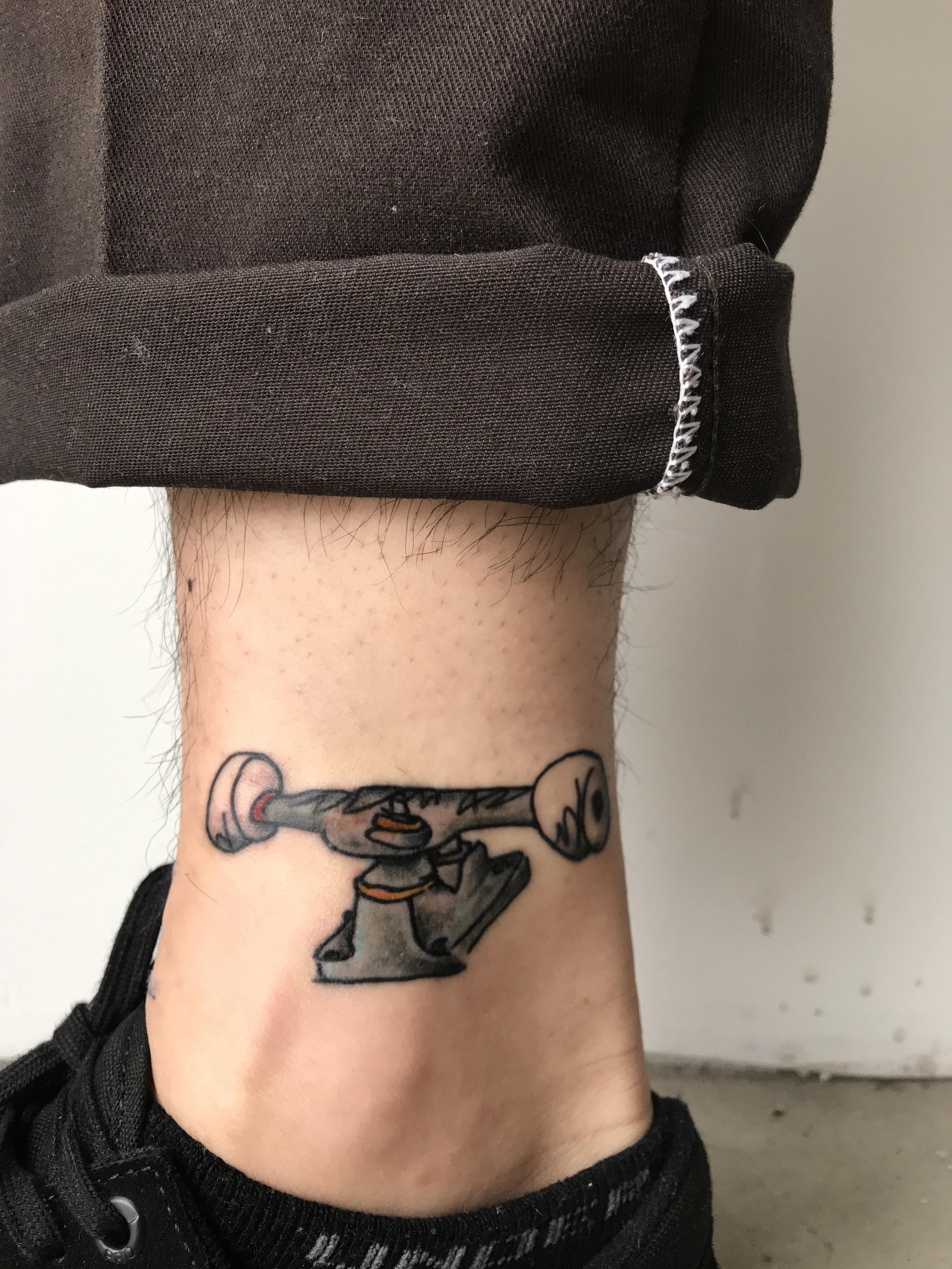 skateboard truck by Dusty at Anchor’s End in Hudson, WI r/tattoos