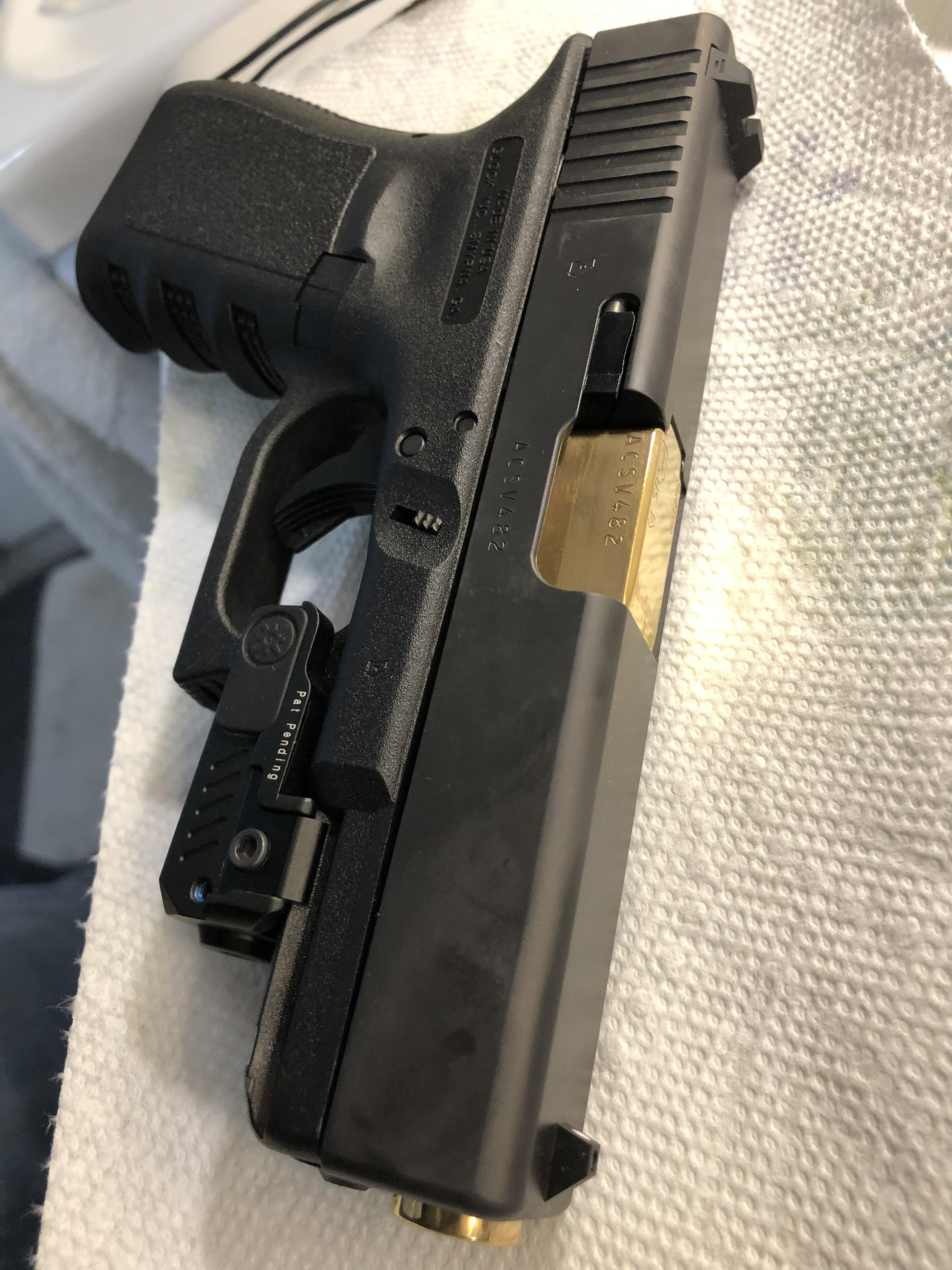 Had my Glock 19 gold (24k) plated today Glocks