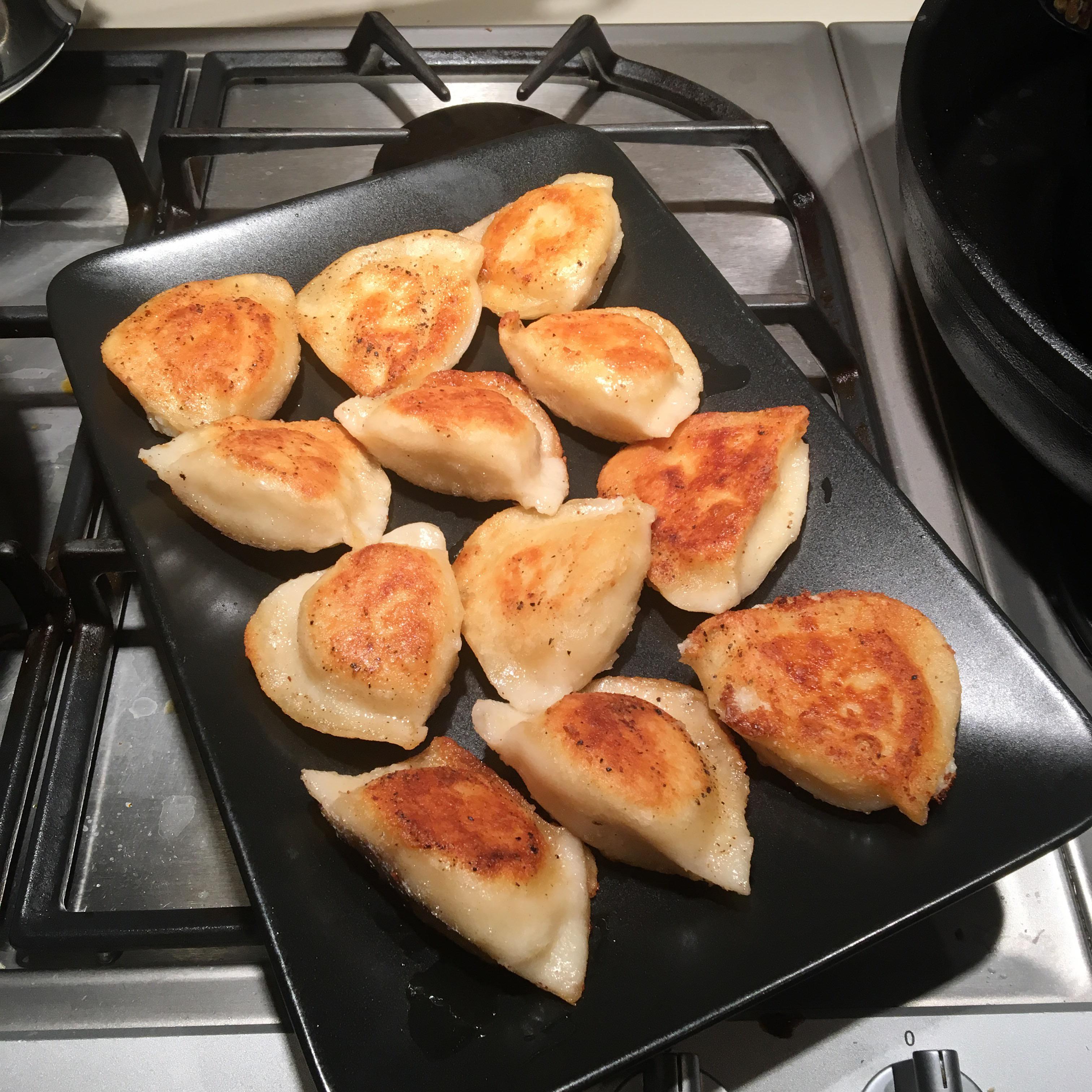 kasia’s potato and cheese pierogi, heated in boiling water and sautéed
