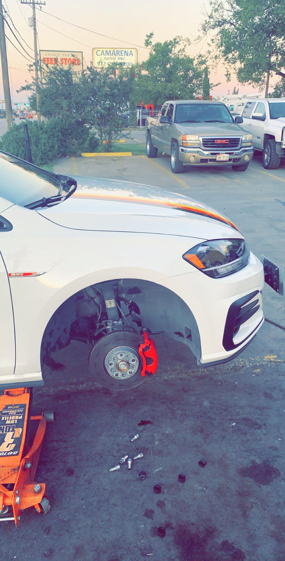 What are the black spots around my rotor ? r/GolfGTI