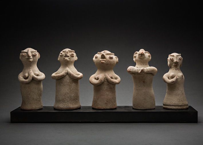 Set of five Indus Valley terracotta figurines with folded hands (2800