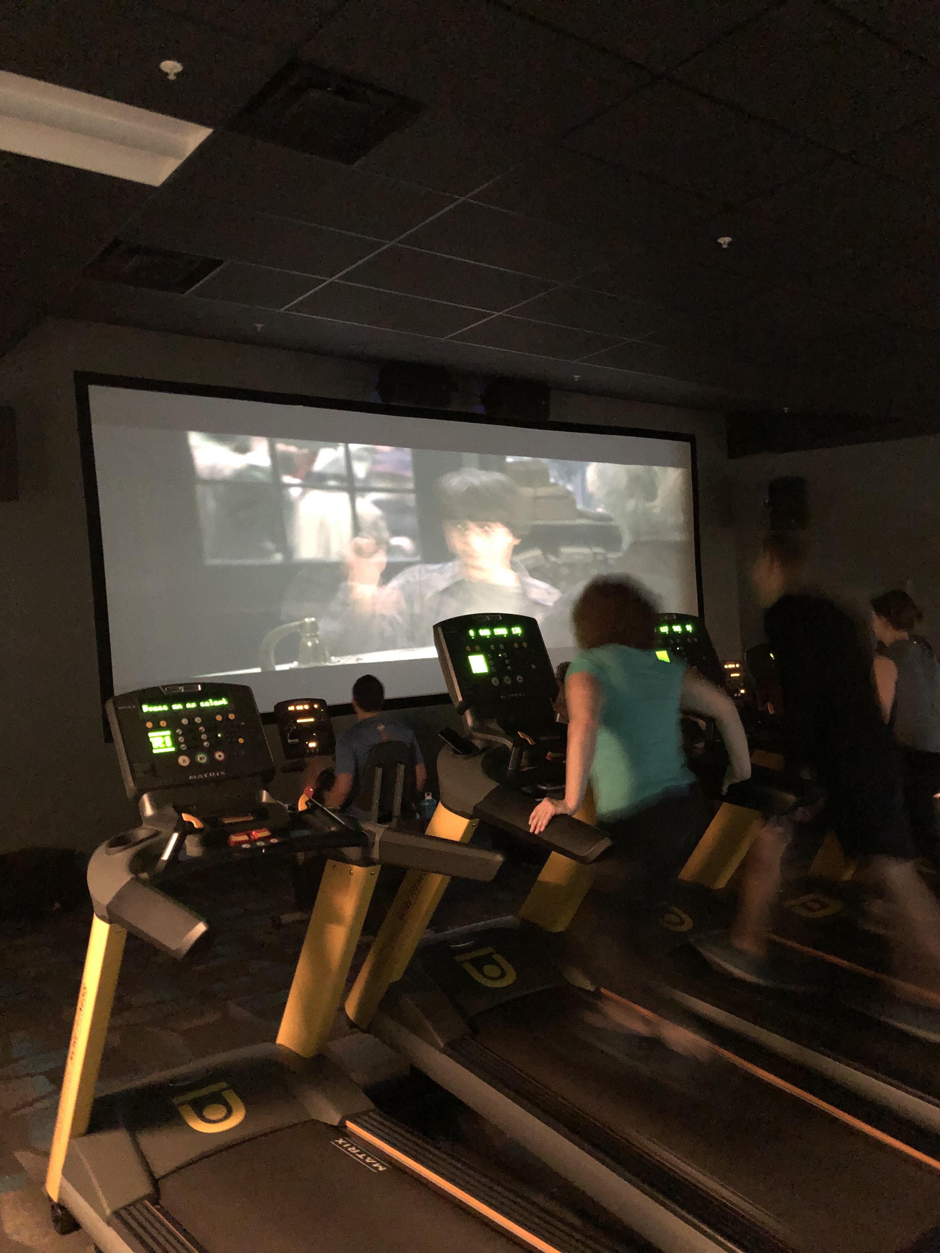 My new gym has a movie theater with cardio equipment so you can watch a