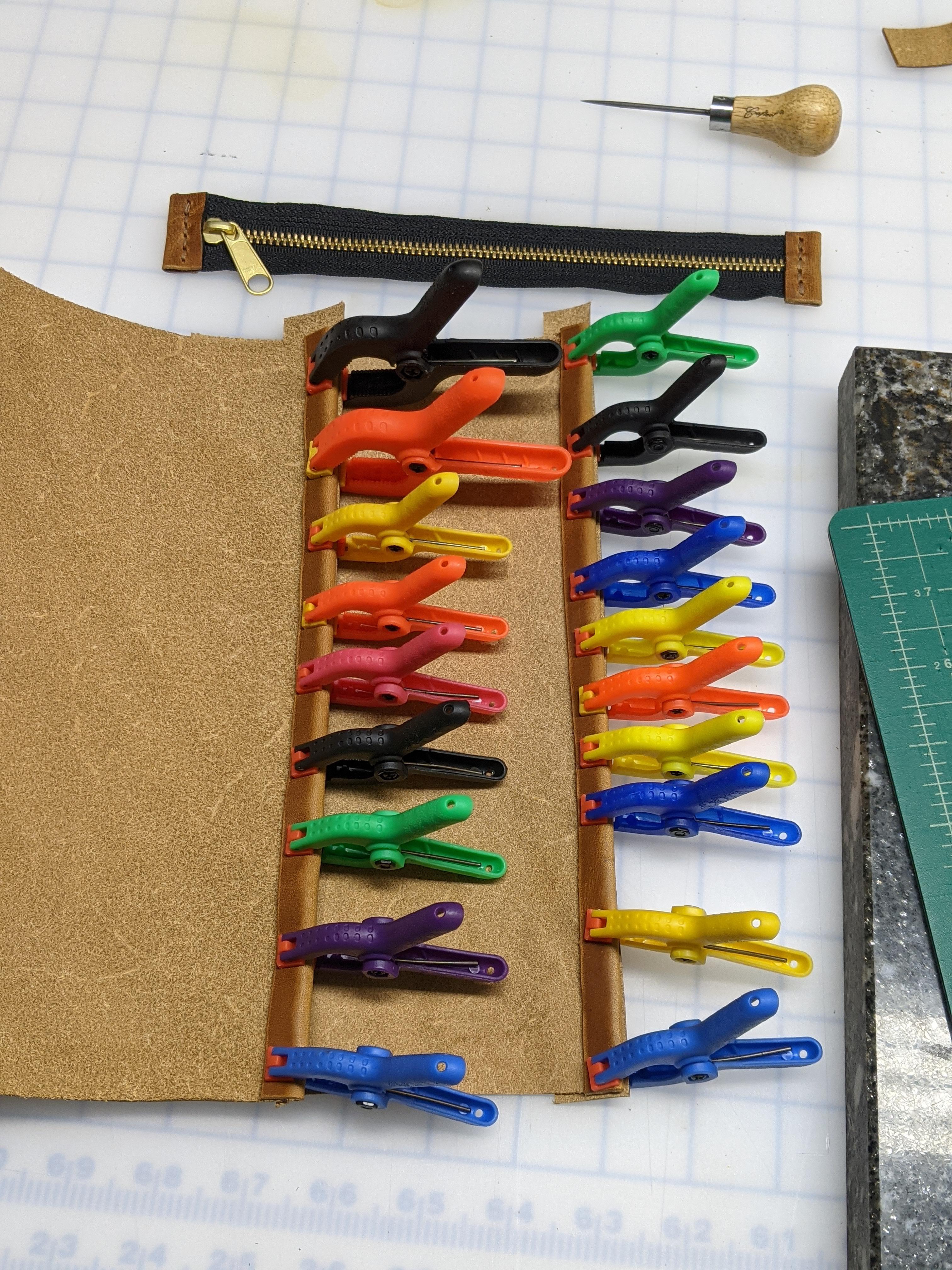 These little clips from Harbor Freight work great for rolled edges. r