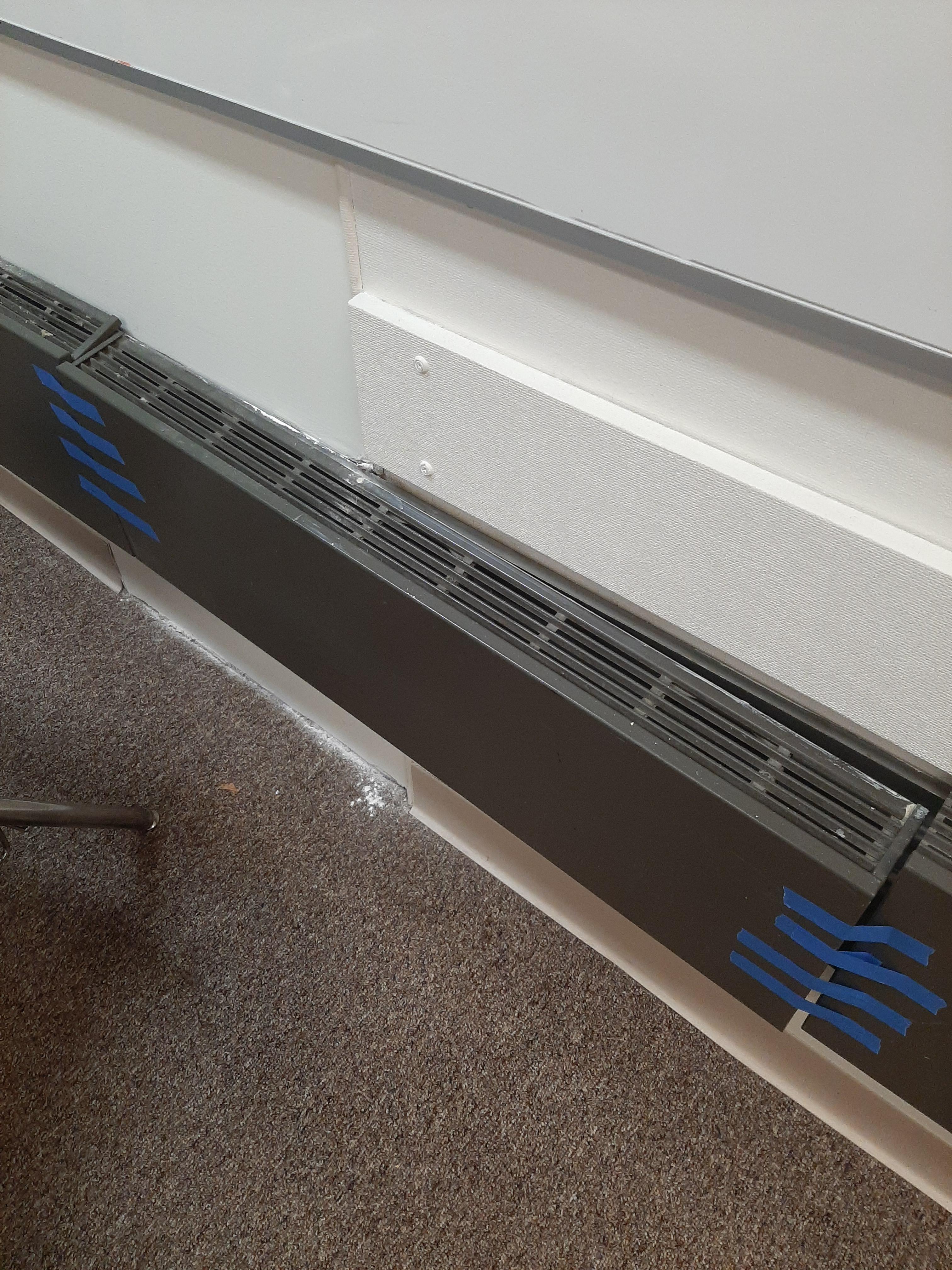 That metal plate fell off exposing a hot water pipe and this is how