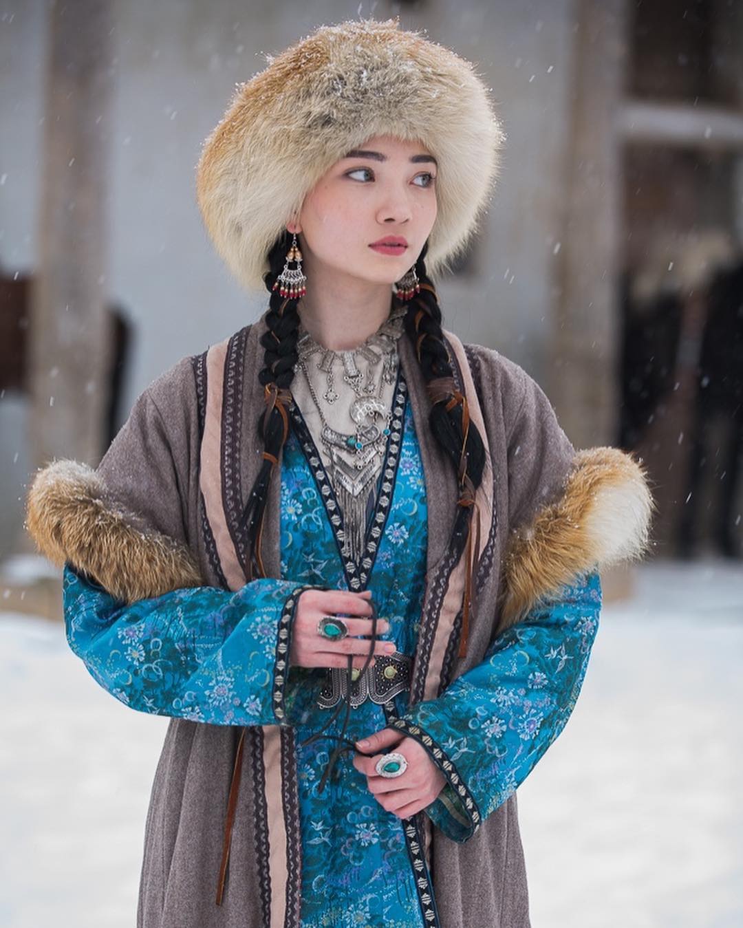 Kazakhstani woman with traditional clothing. r/pics