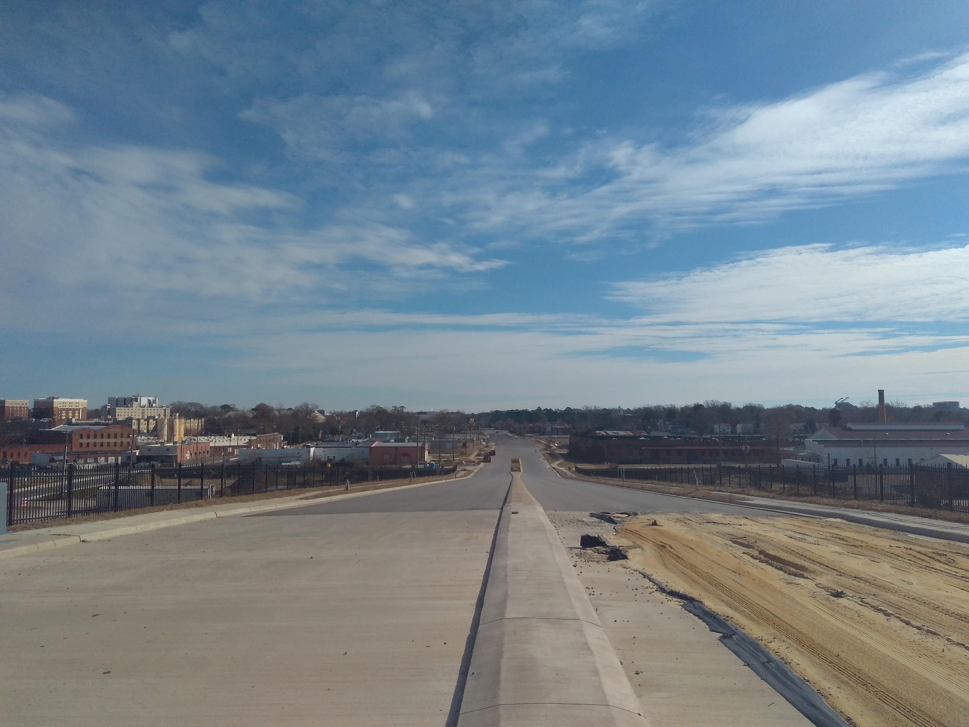 Looking towards Evans St from the top of the 10th St overpass. r
