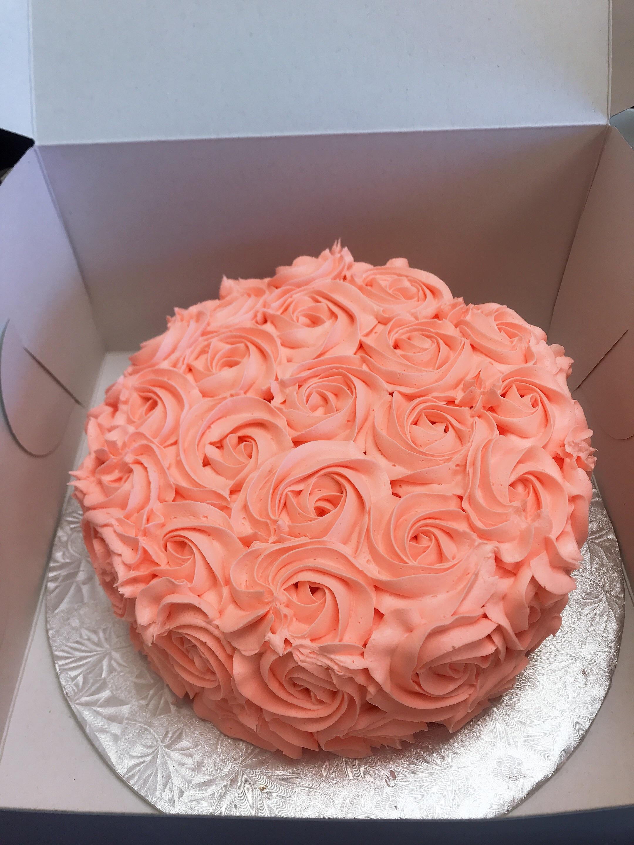 First attempt at buttercream roses. Was a hit at work! r/Baking