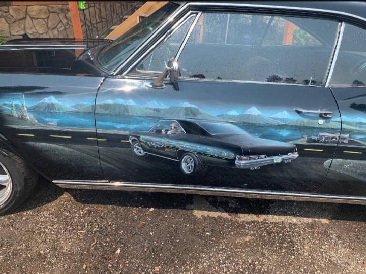 This Impala on Craigslist with a "One of a kind perpetual paint job