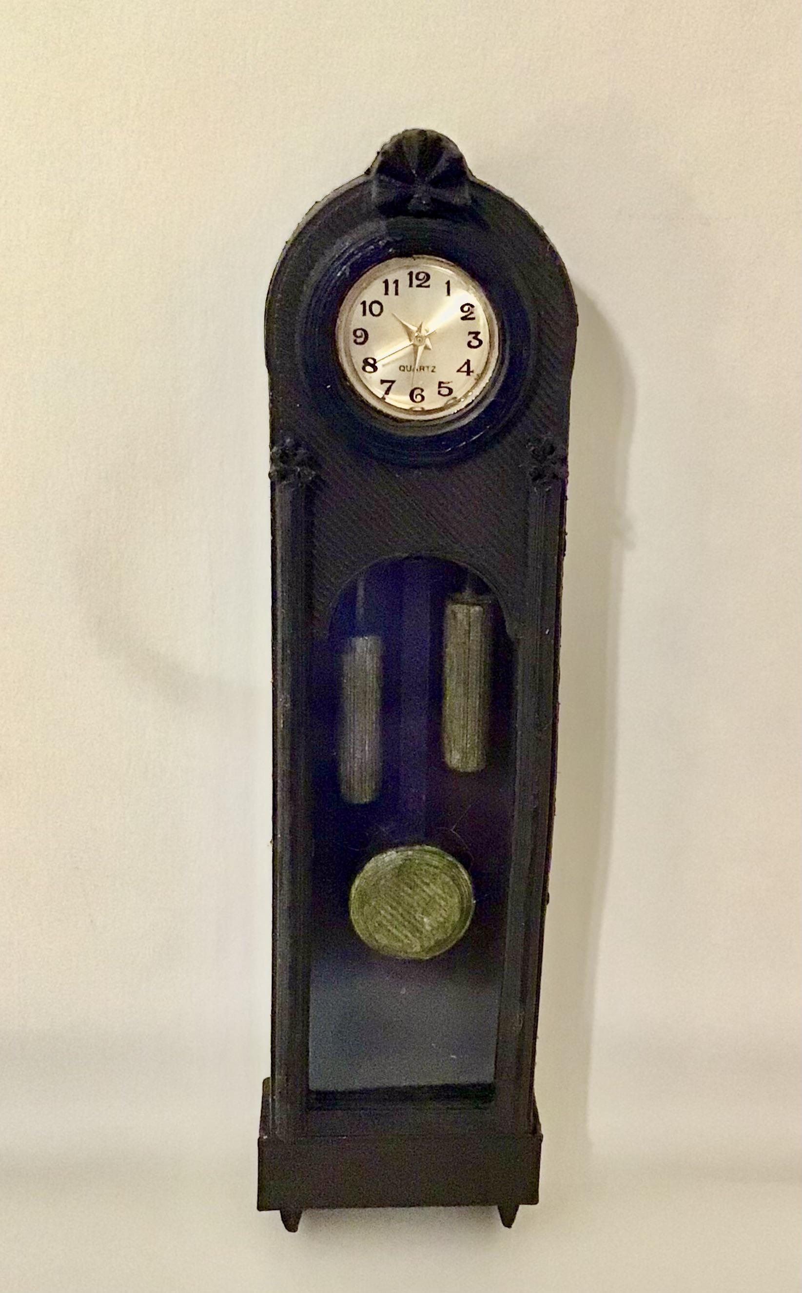 Had a bunch of quartz watch movements, printed some mini antique clock