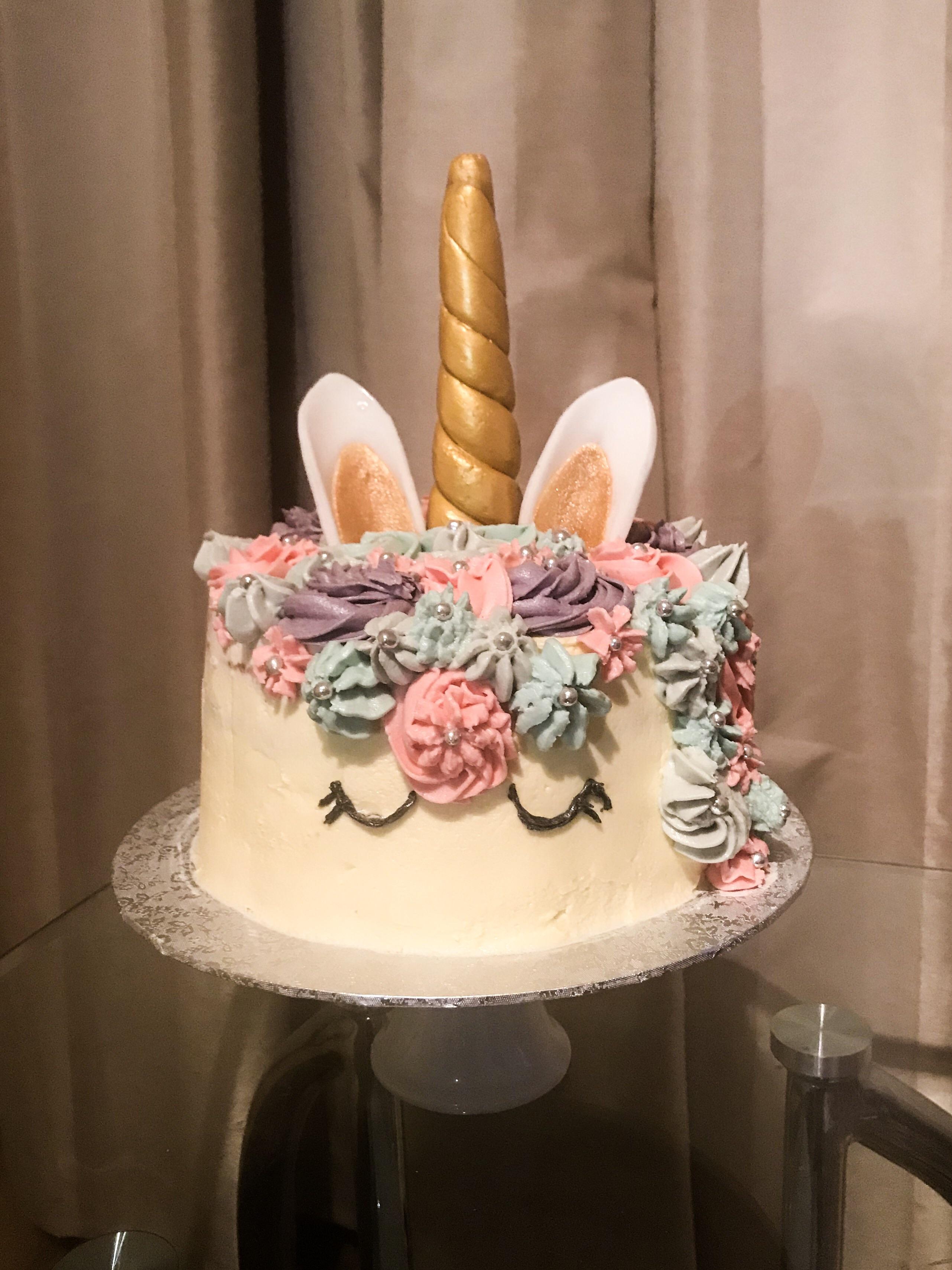 First attempt at a unicorn cake! Any tips on how to get the frosting