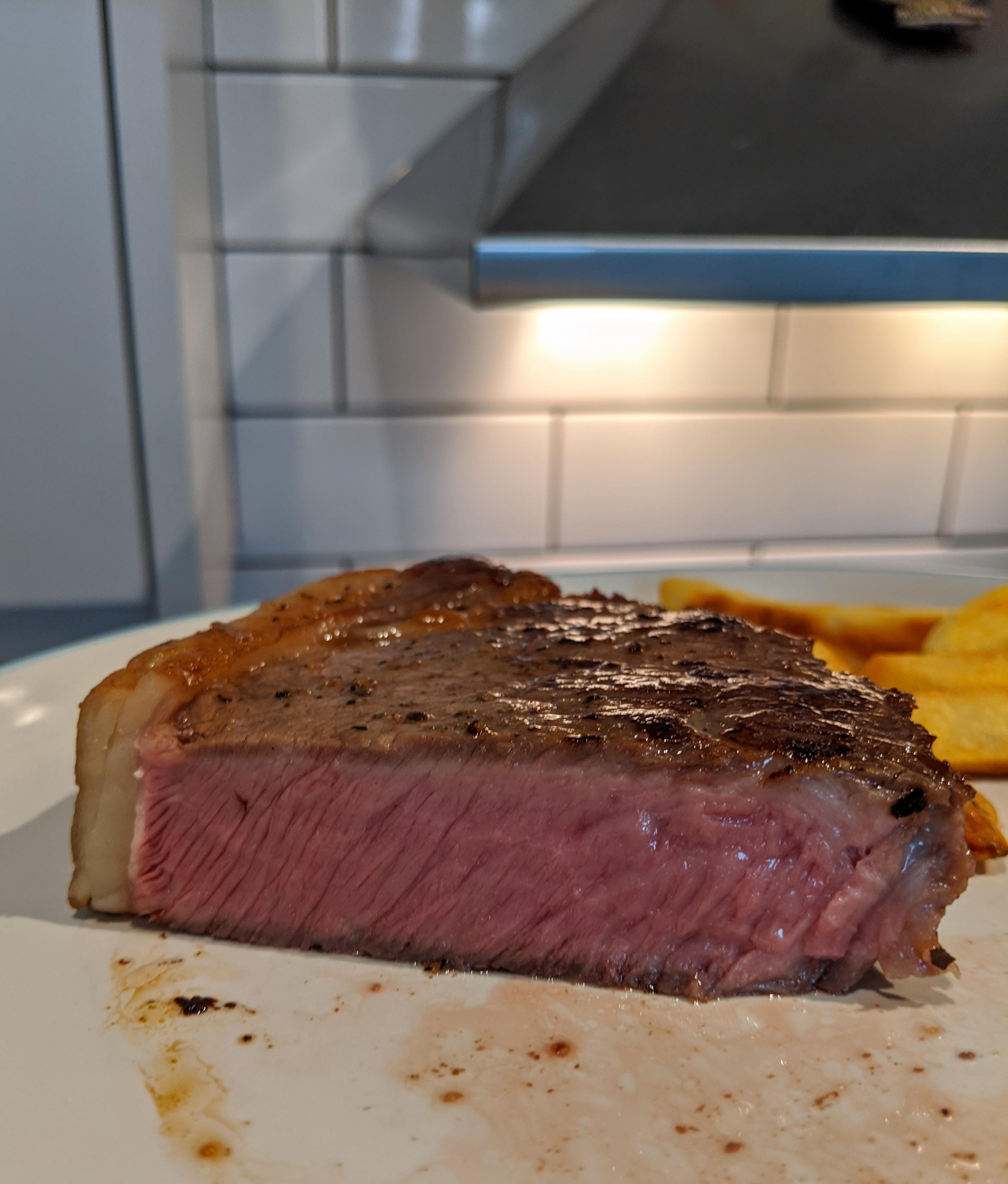 Reverse seared sirloin steak finished on cast iron. r/steak
