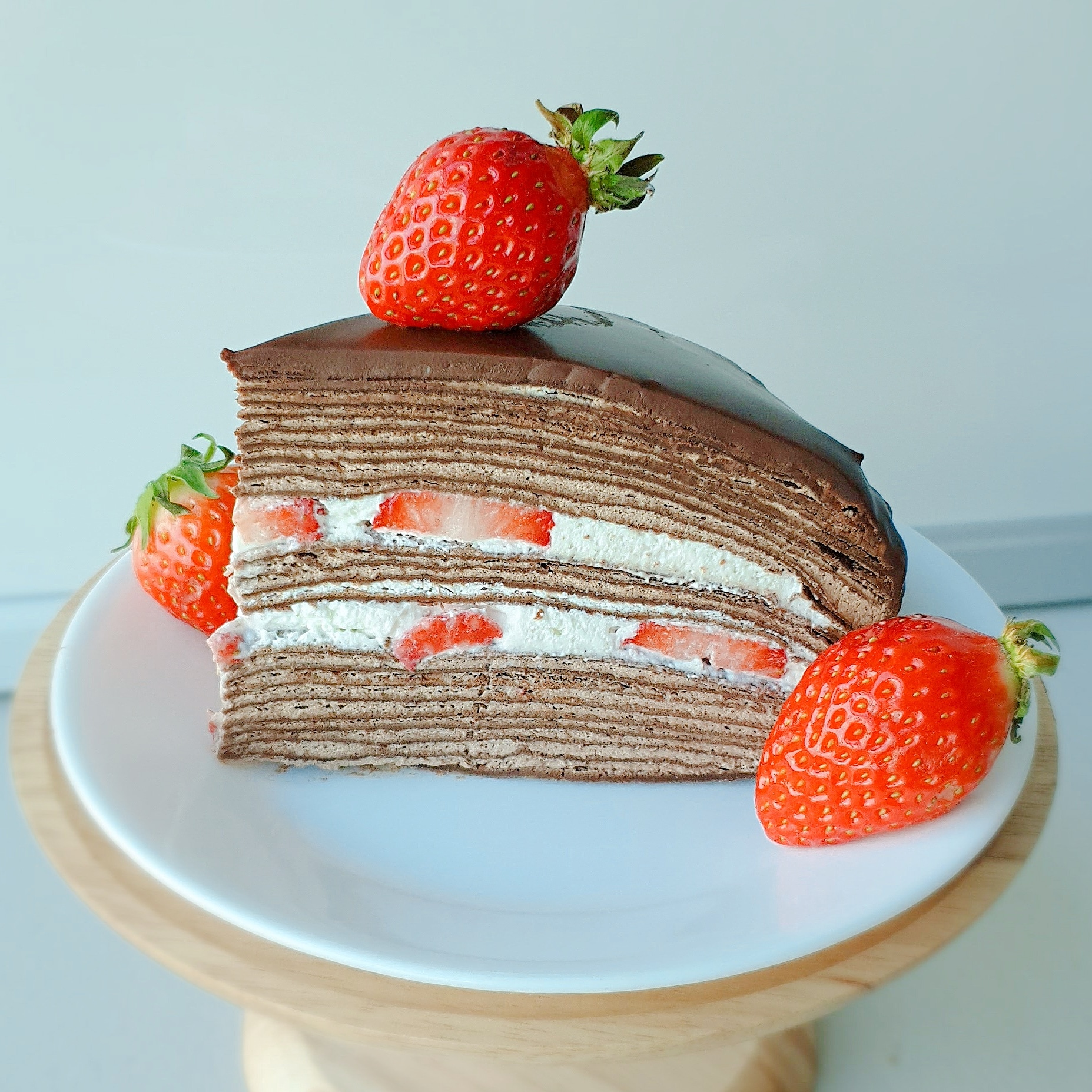 Chocolate strawberry crepe cake for my cake day r/Baking